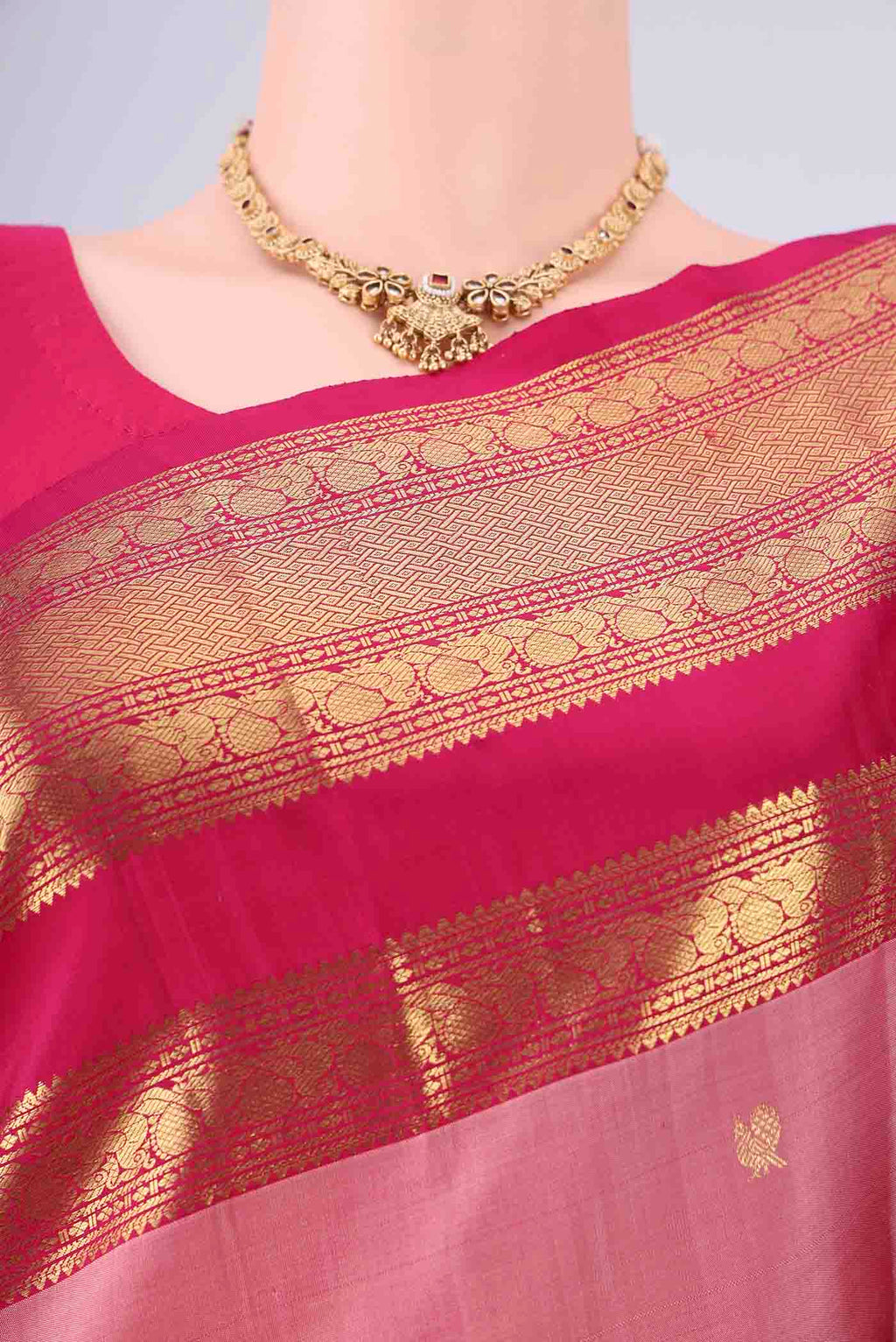 Border image of Rose Gold Kanchipuram Silk Saree with Zari Butta on the body and Zari Border. 
