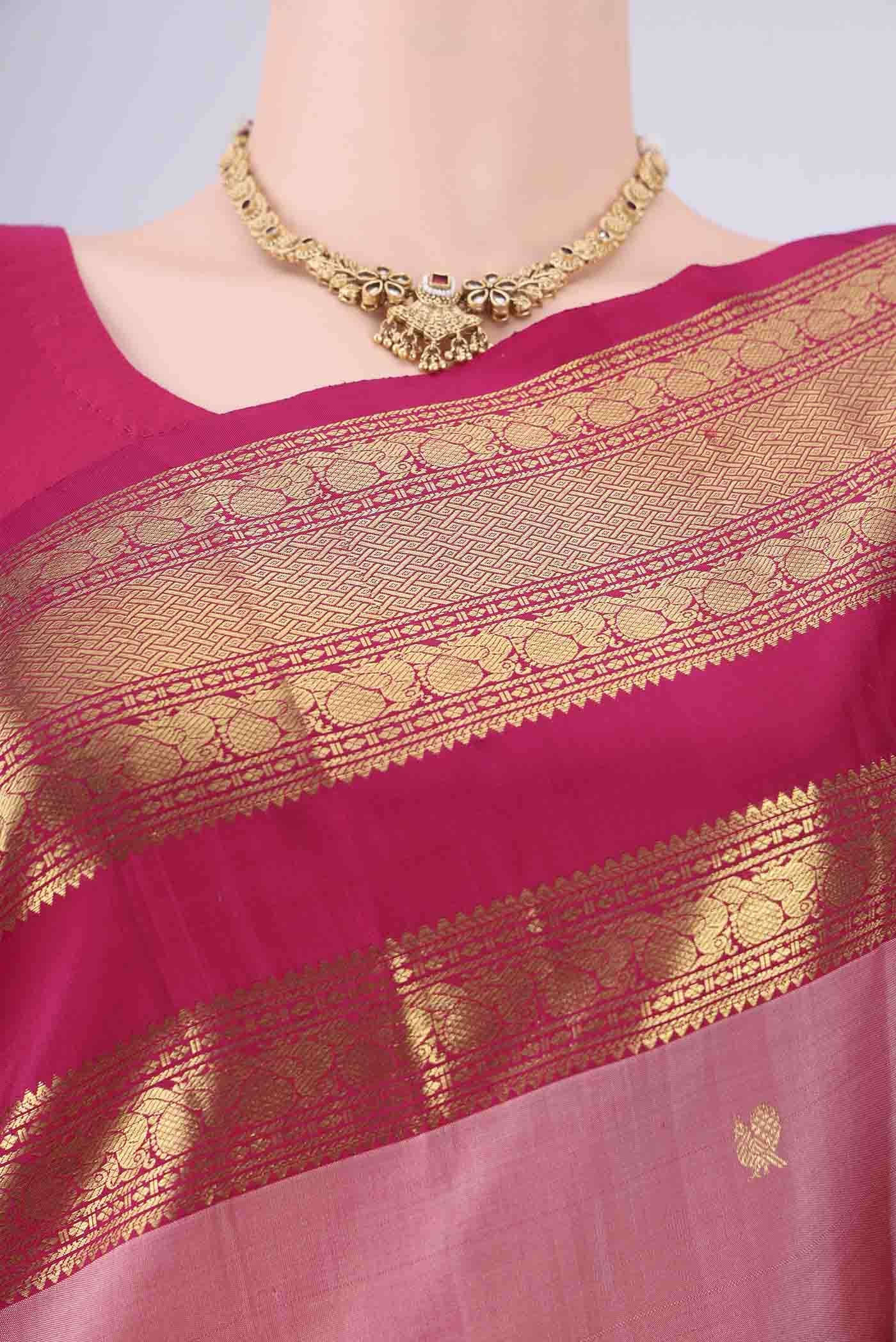 Border image of Rose Gold Kanchipuram Silk Saree with Zari Butta on the body and Zari Border. 