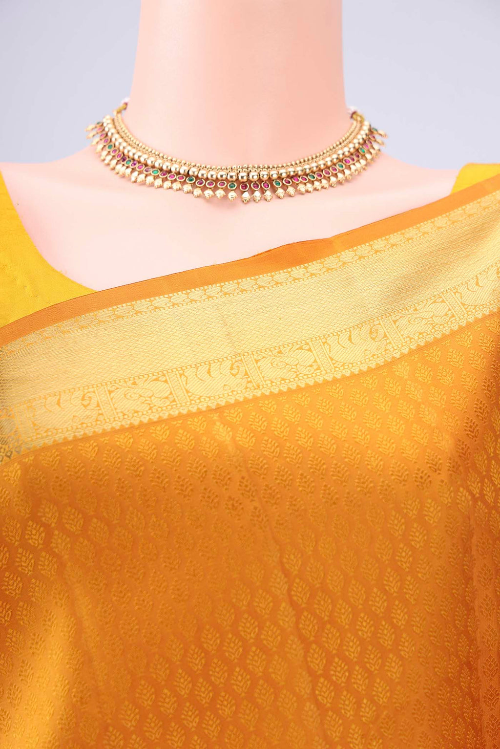 Border image of Mustard Kanjivaram Silk Saree with Jacquard design on the body and Zari Border. 