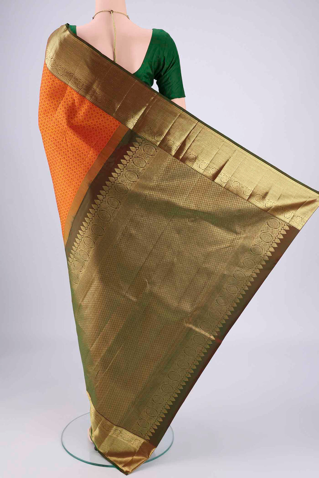 Flat view of Mustard Dual Tone Kanjivaram Saree with Jacquard design on the body and Zari Border. 