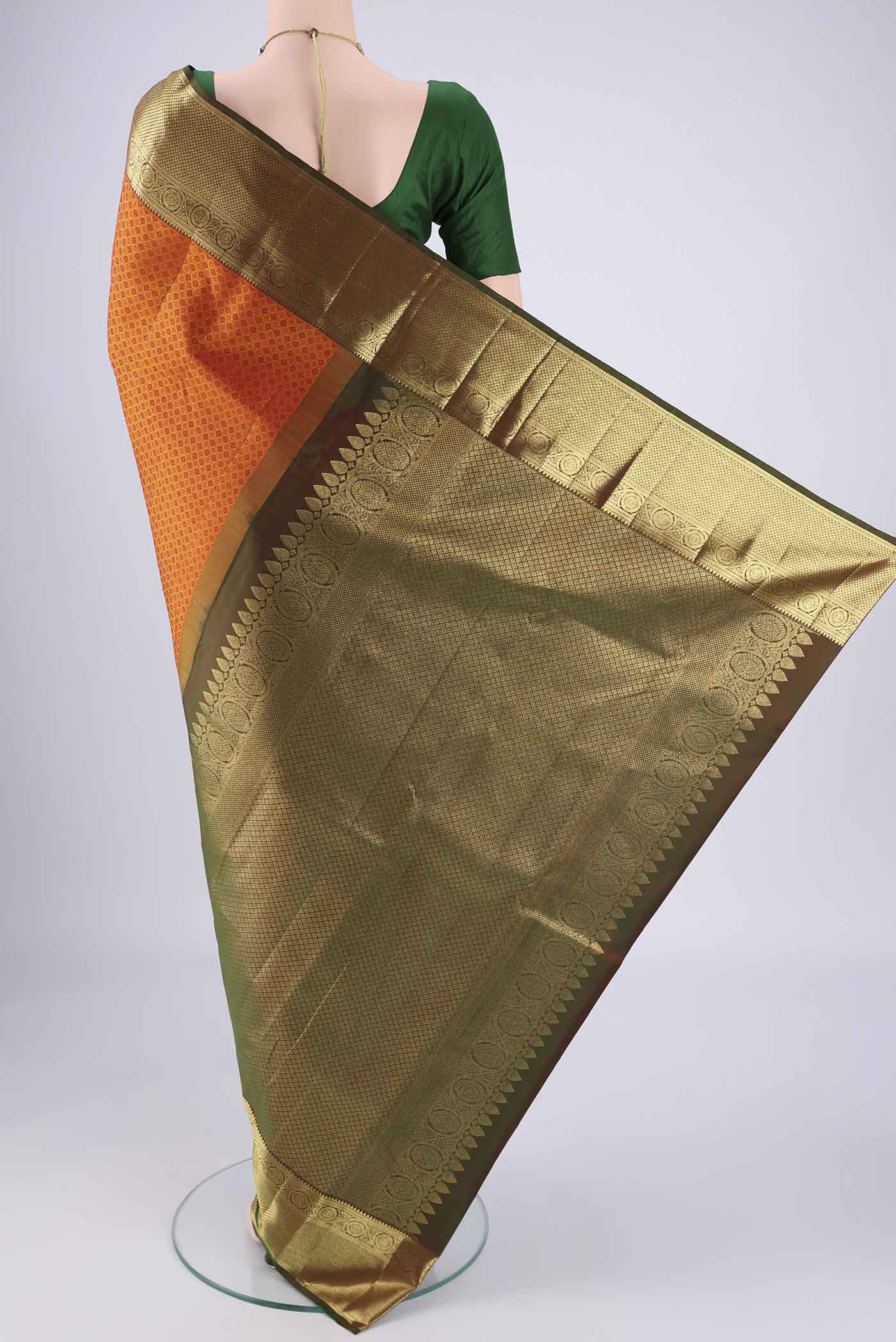 Flat view of Mustard Dual Tone Kanjivaram Saree with Jacquard design on the body and Zari Border. 