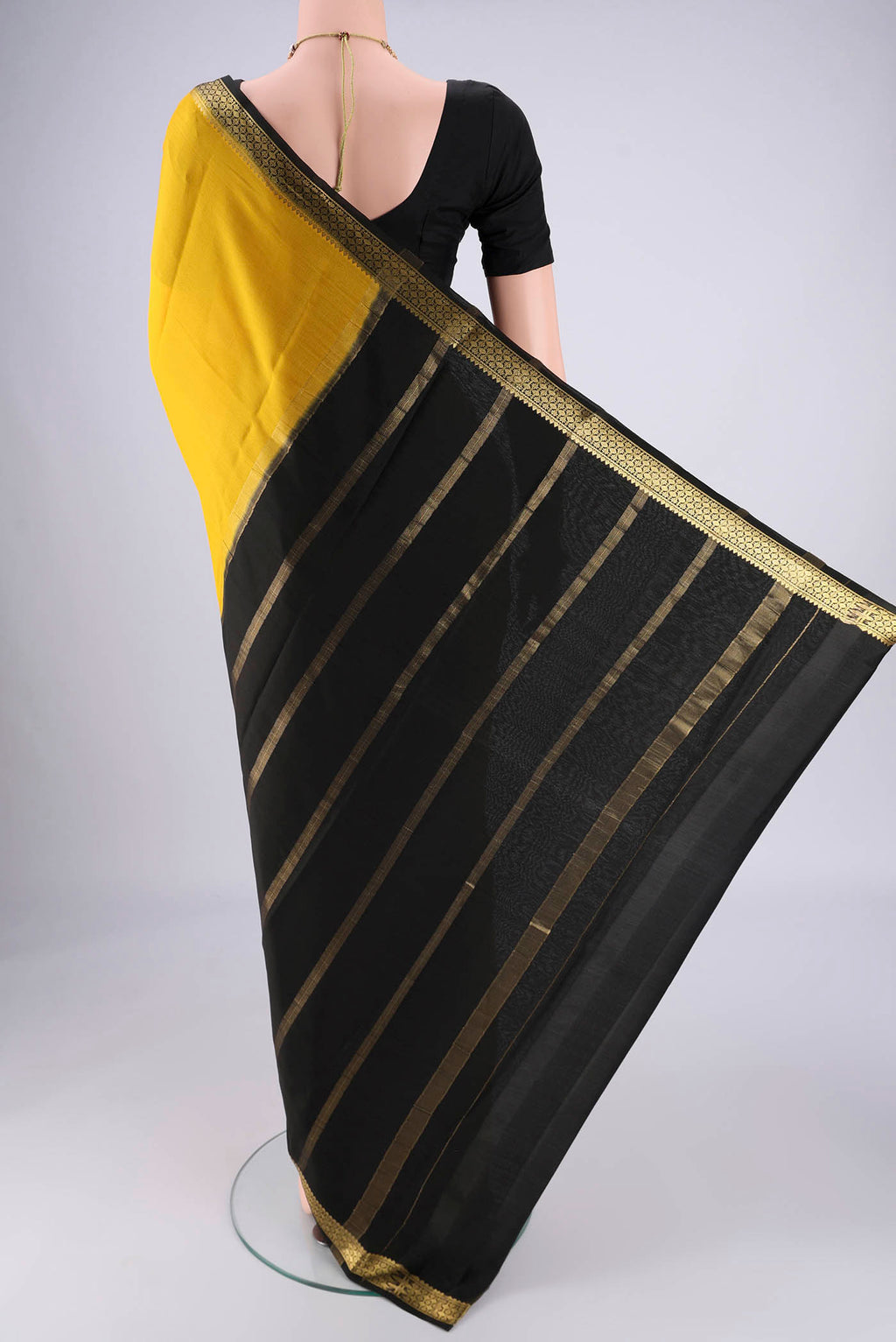 Flat view of Yellow Mysore Georgette Saree with Plain Body and Zari Border. 