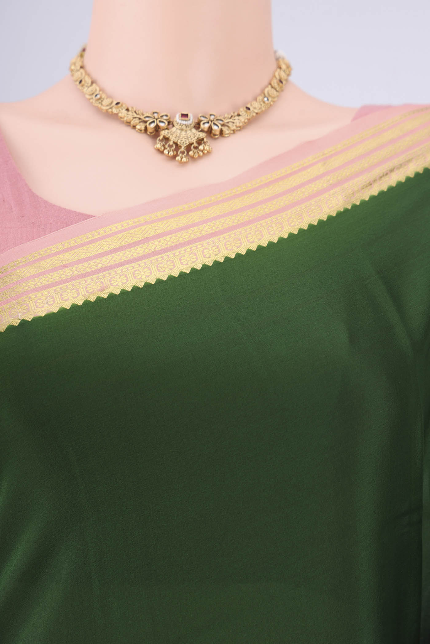 Border image of Bottle Green Mysore Georgette Saree with Zari Butta on the body and Zari Border. 