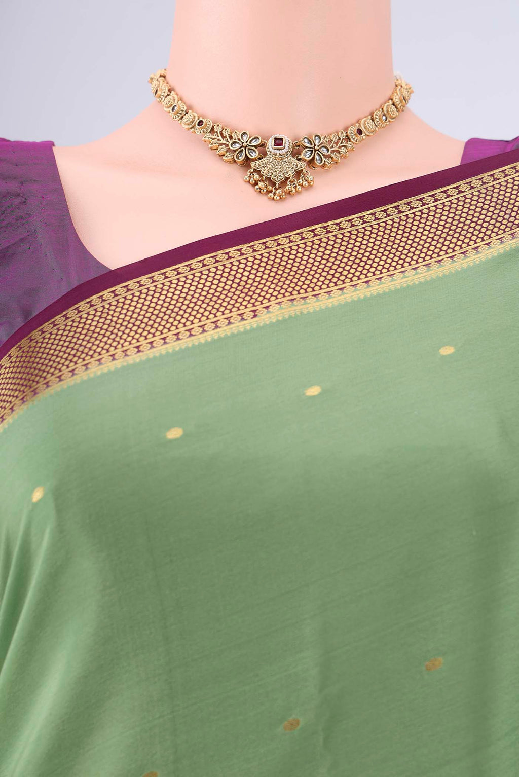 Border image of Pista Green Mysore Georgette Saree with Zari Butta on the body and Zari Border. 