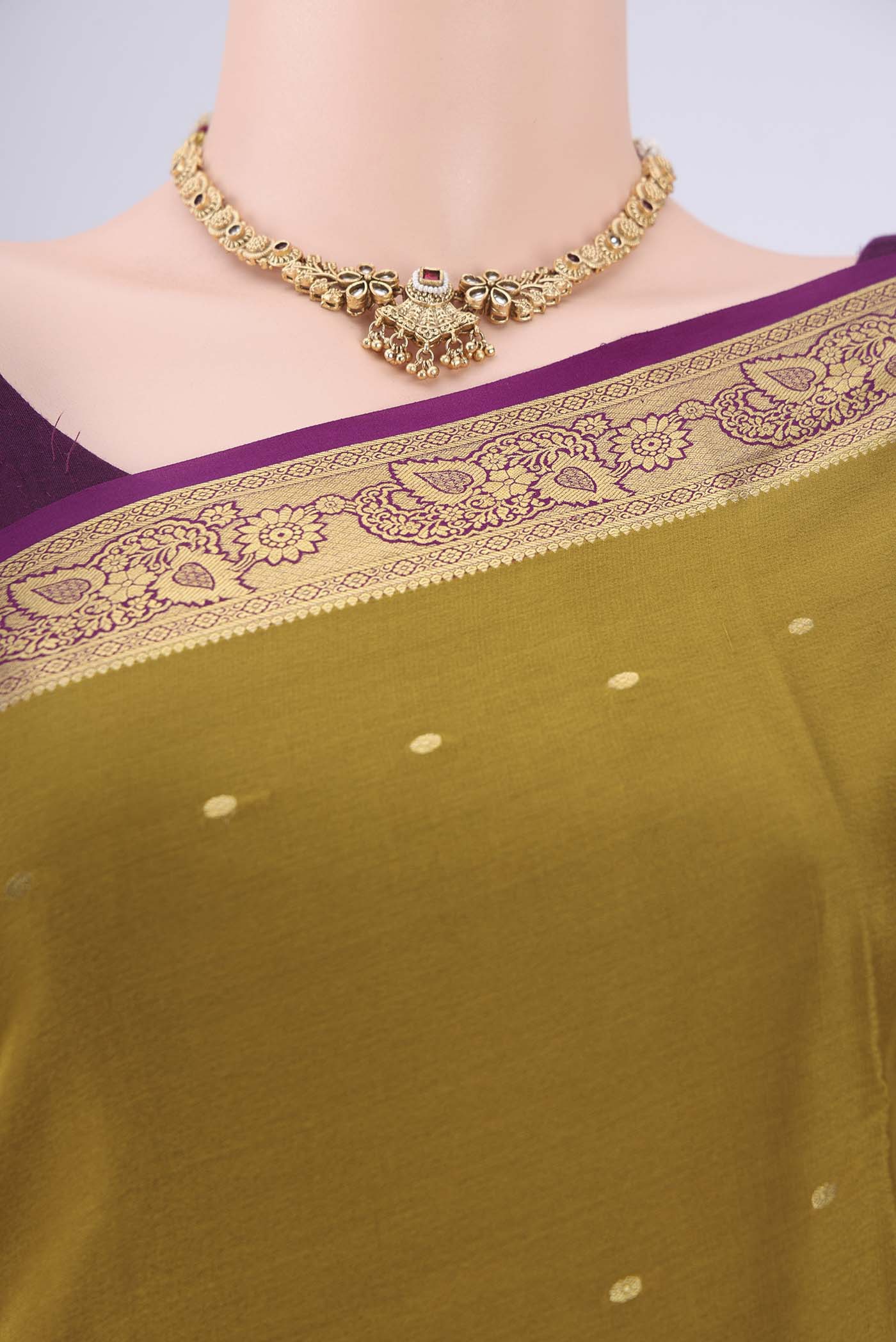 Border image of Mehandi Green Mysore Georgette Saree with Zari Butta on the body and Zari Border. 