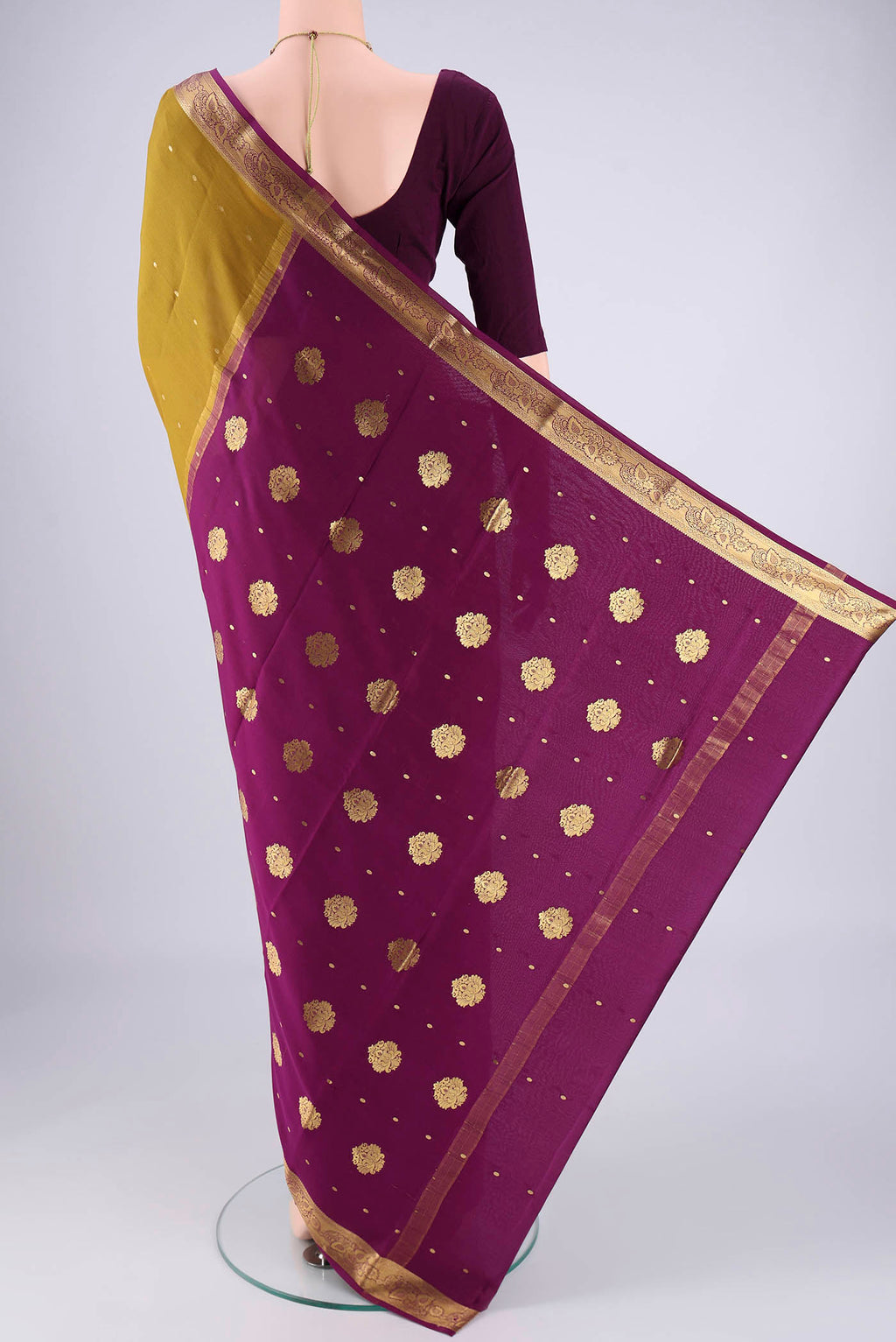 Flat view of Mehandi Green Mysore Georgette Saree with Zari Butta on the body and Zari Border. 