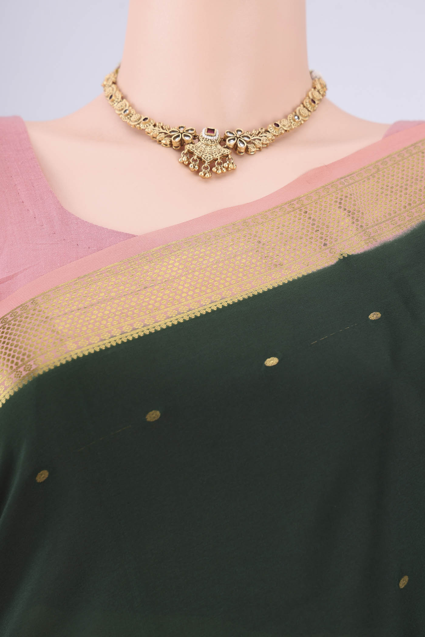 Border image of Bottle Green Mysore Georgette Saree with Zari Butta on the body and Zari Border. 