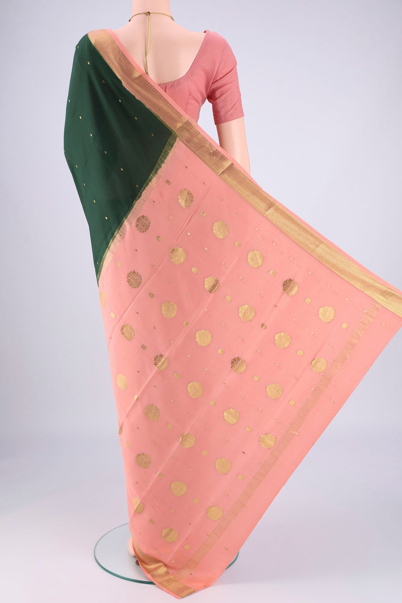 Flat view of Bottle Green Mysore Georgette Saree with Zari Butta on the body and Zari Border. 
