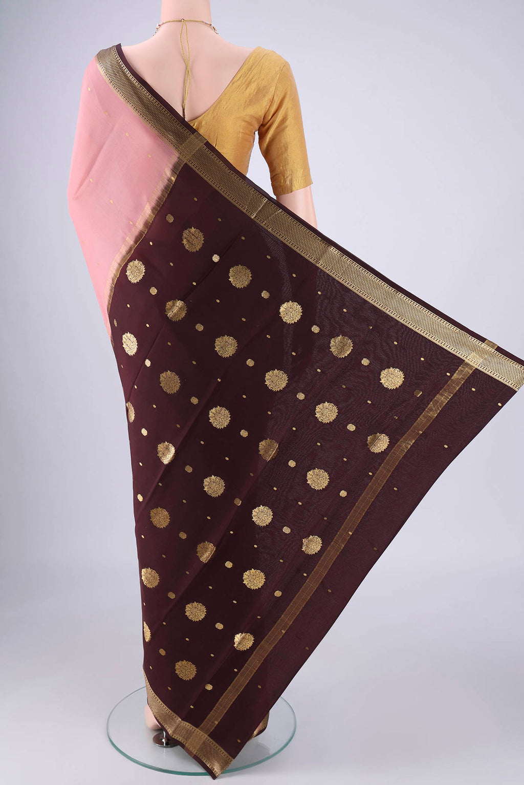Flat view of Rose pink Mysore Crepe Saree with Zari Butta on the body and Zari Border. 