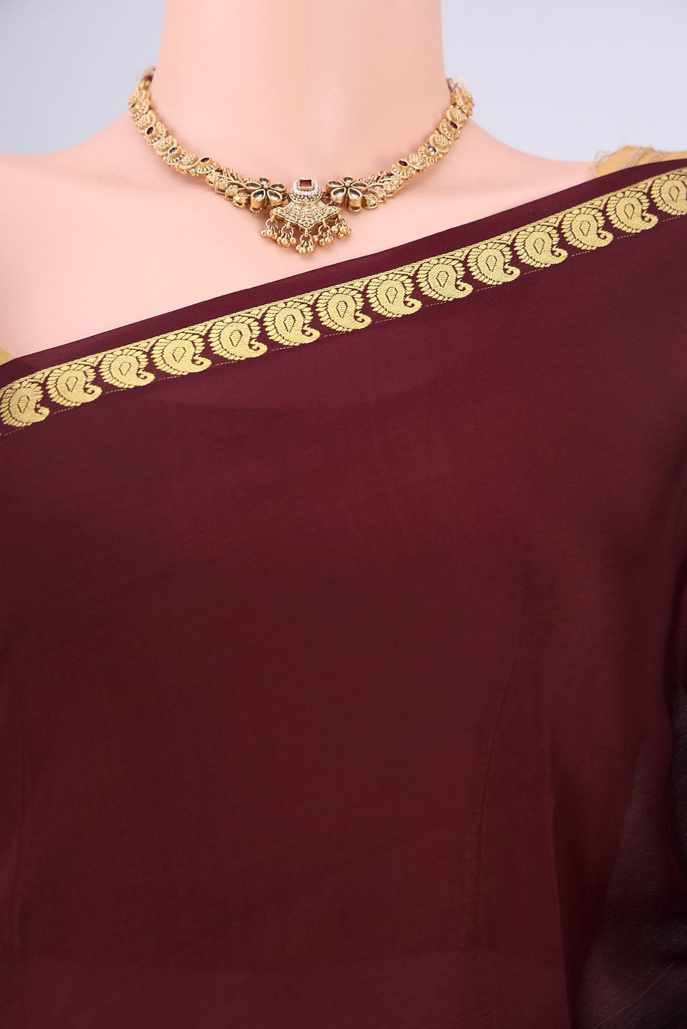 Border image of Coffee Brown Mysore Crepe Saree with Plain Body and Zari Border. 