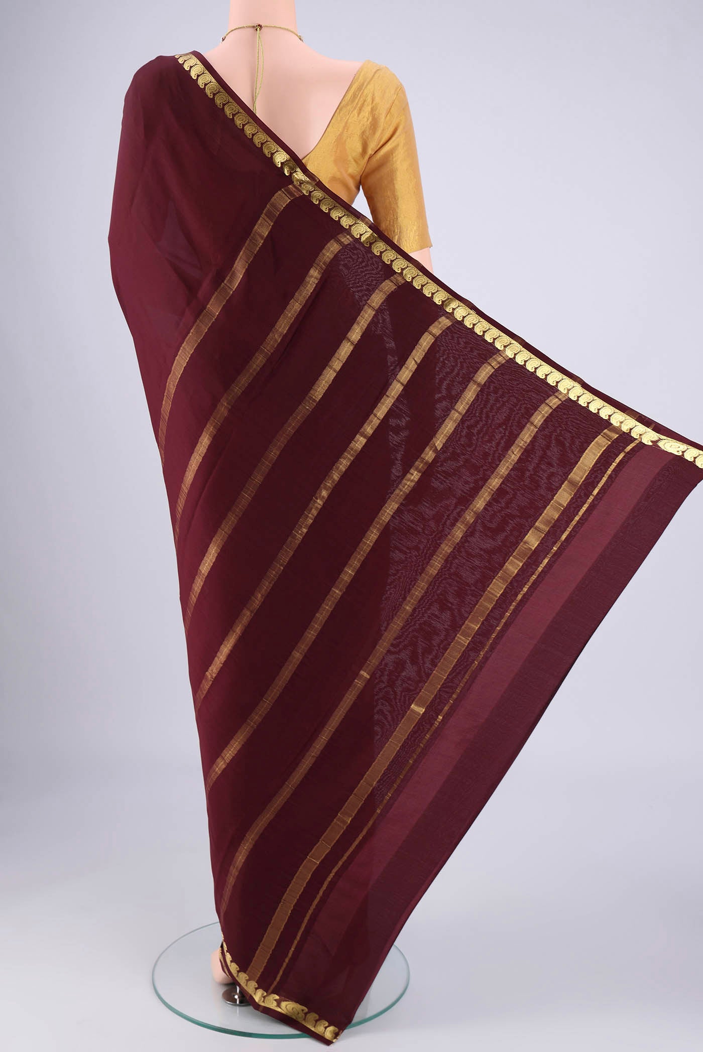 Flat view of Coffee Brown Mysore Crepe Saree with Plain Body and Zari Border. 