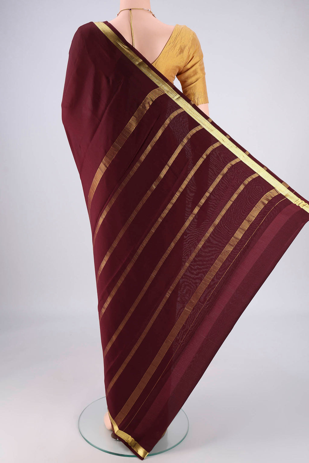 Flat view of Coffee Brown Mysore Crepe Saree with Plain Body and Zari Border. 