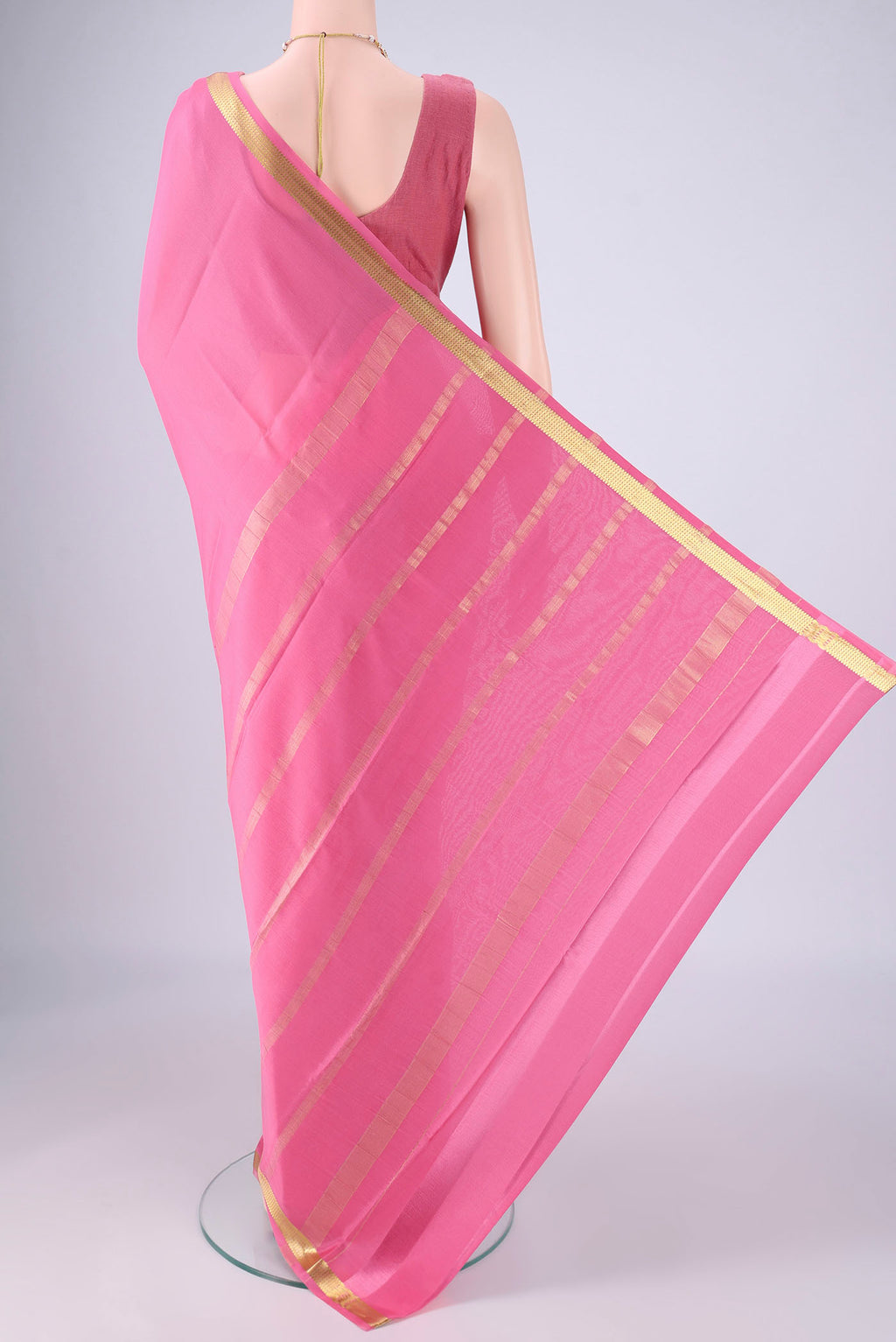 Flat view of Pink Mysore Crepe Saree with Plain Body and Zari Border. 
