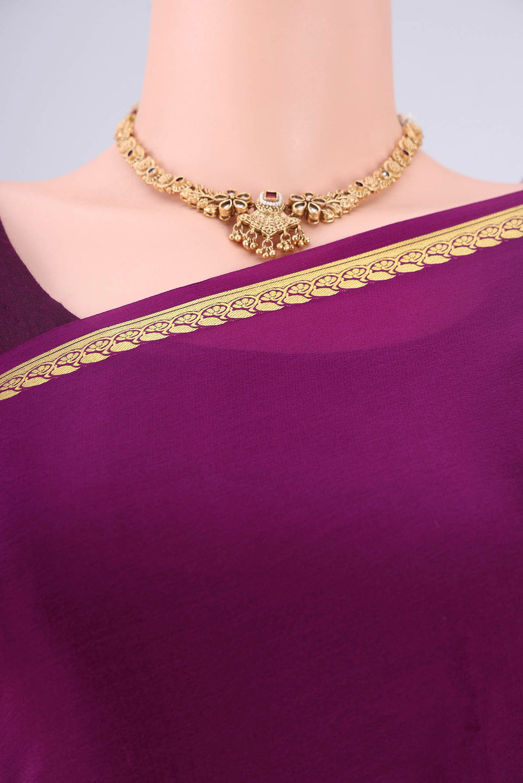 Border image of Purple Mysore Crepe Saree with Plain Body and Zari Border. 