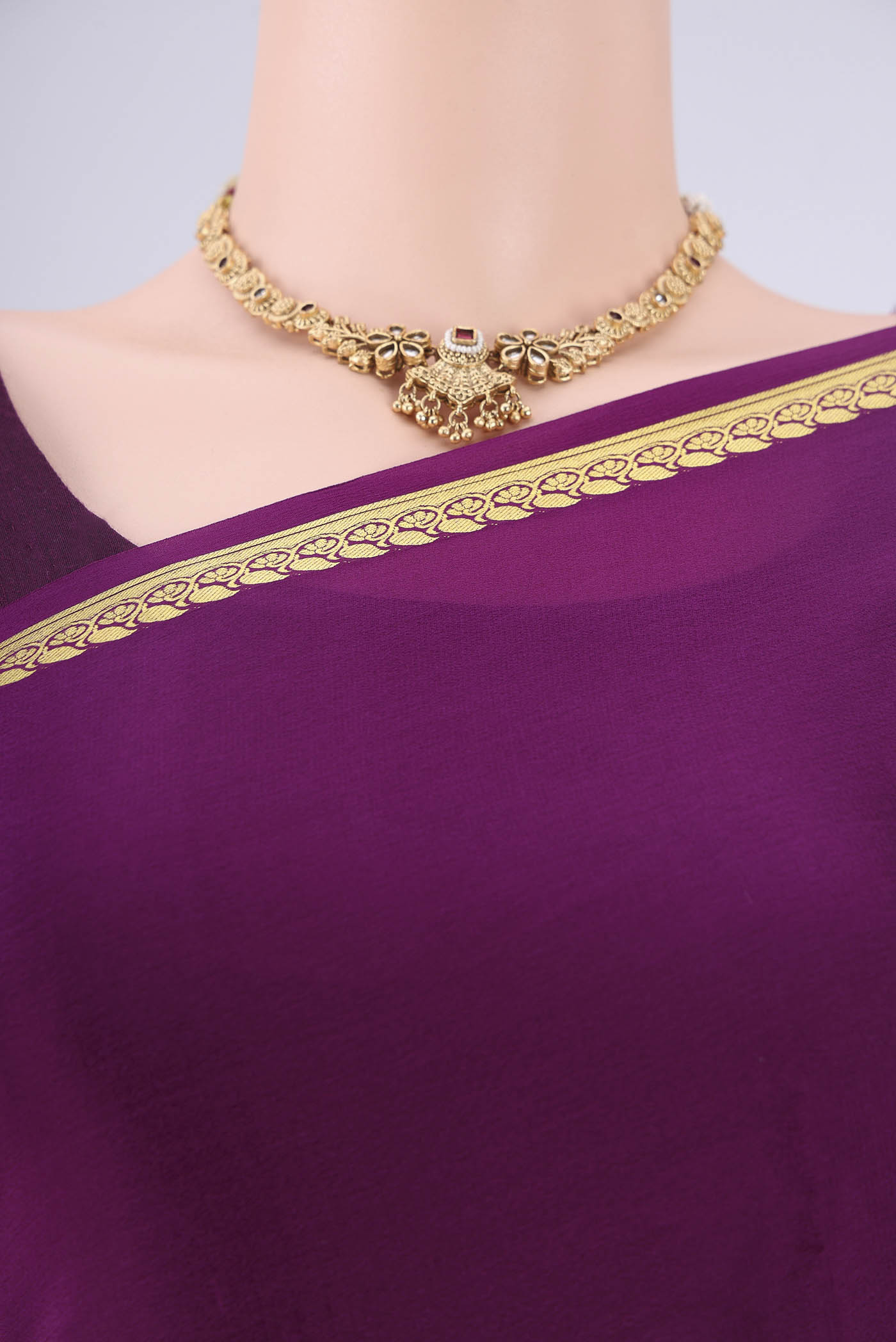 Border image of Purple Mysore Crepe Saree with Plain Body and Zari Border. 