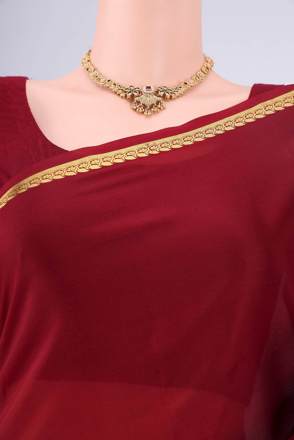 Border image of Maroon Mysore Crepe Saree with Plain Body and Zari Border. 