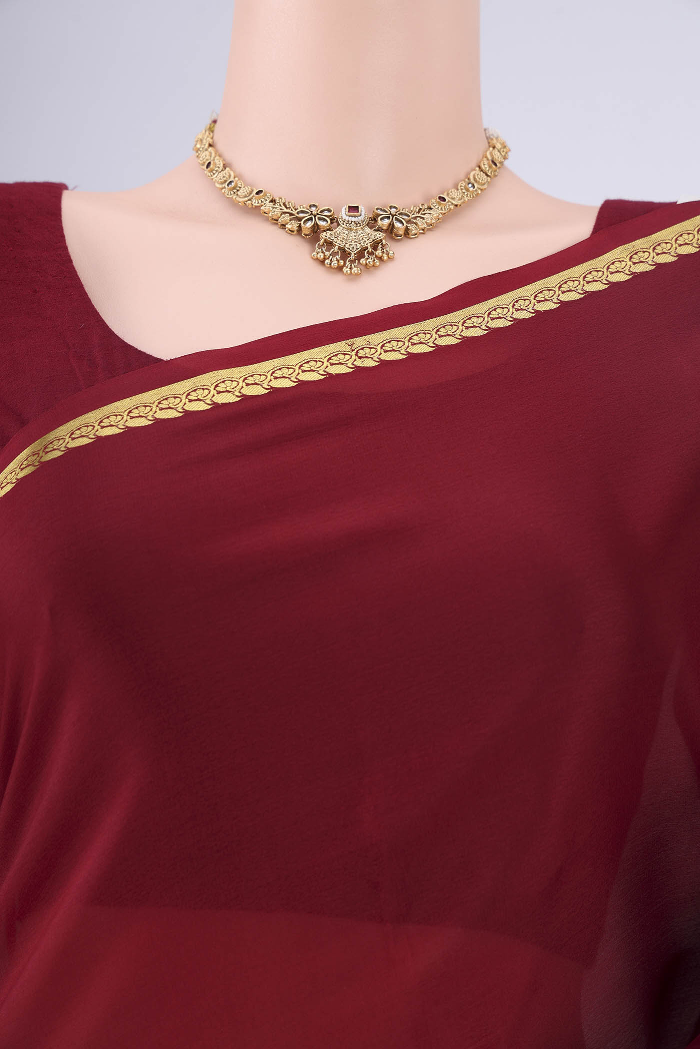 Border image of Maroon Mysore Crepe Saree with Plain Body and Zari Border. 