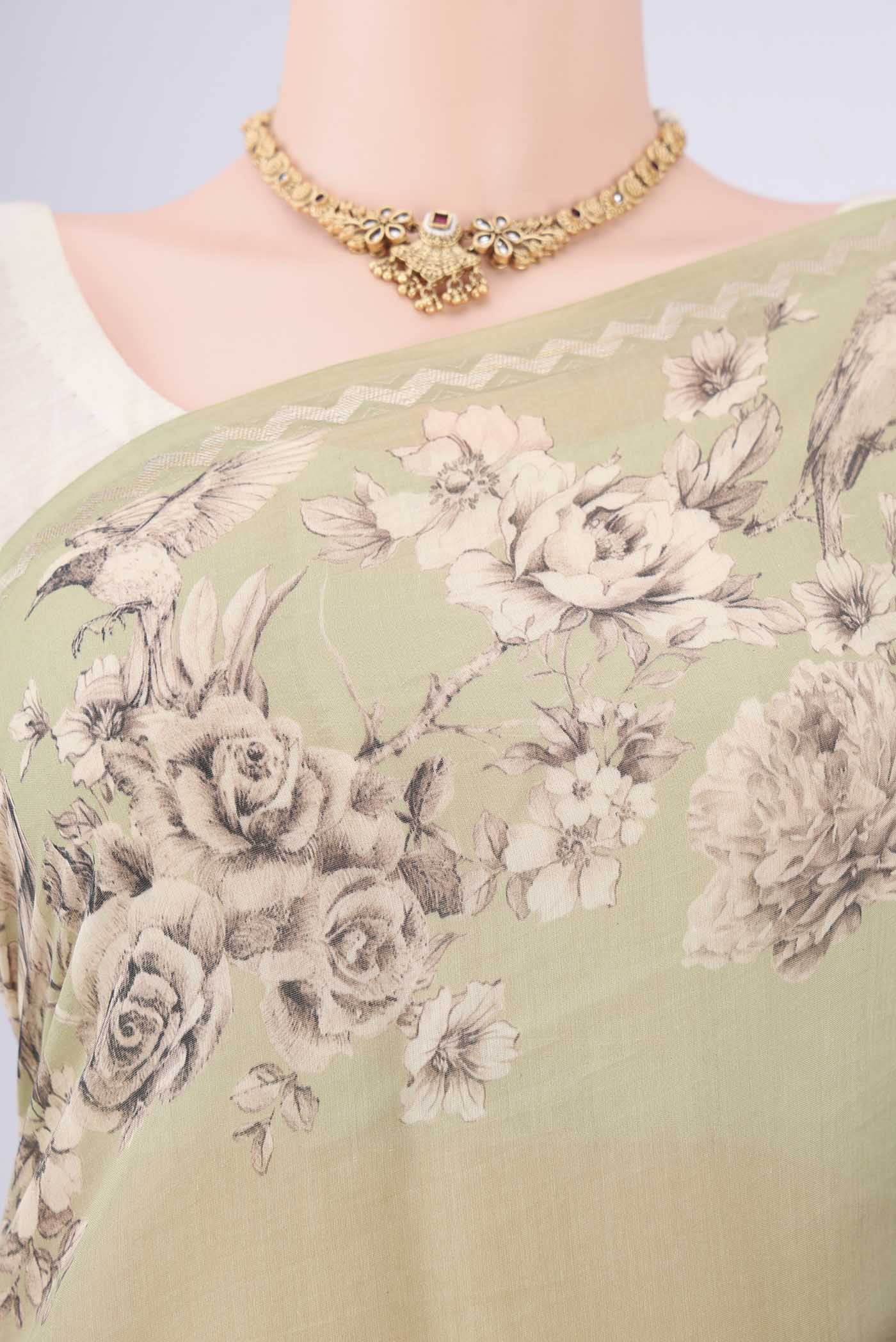 Border image of Pista Green Chanderi Silk Cotton Saree with Floral Print on the body and Zari Border. 
