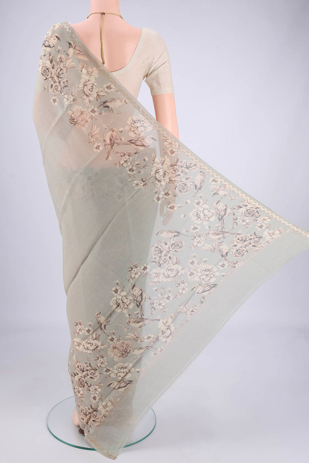 Flat view of Davys Grey Chanderi Silk Cotton Saree with Floral Print on the body and Zari Border. 