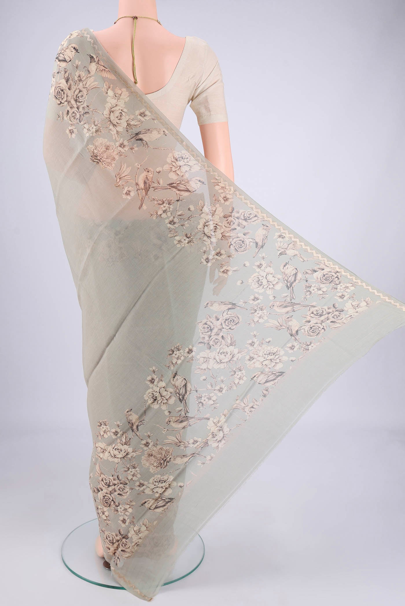 Flat view of Davys Grey Chanderi Silk Cotton Saree with Floral Print on the body and Zari Border. 