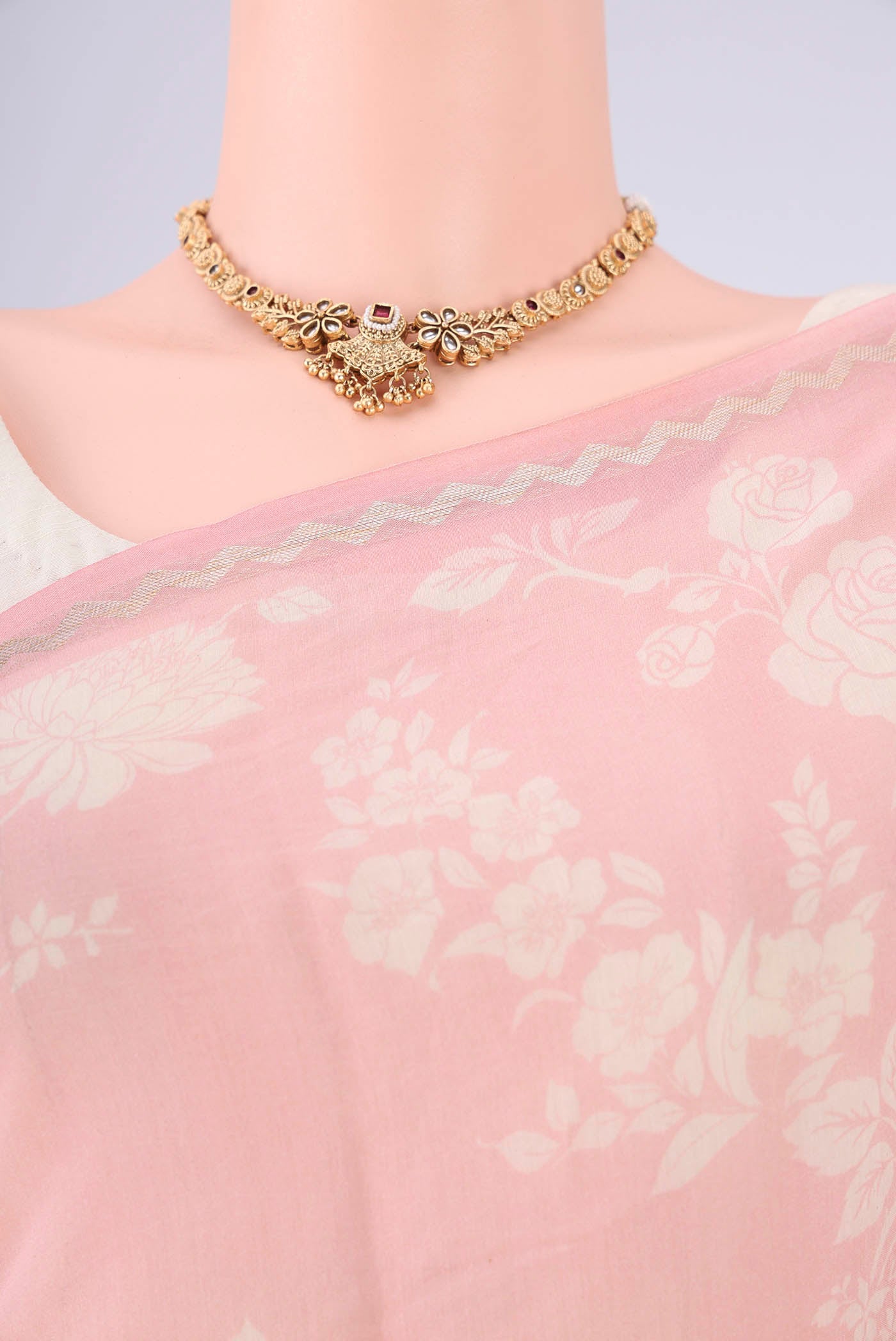 Border image of Rose pink Chanderi Silk Cotton Saree with Floral Print on the body and Zari Border. 