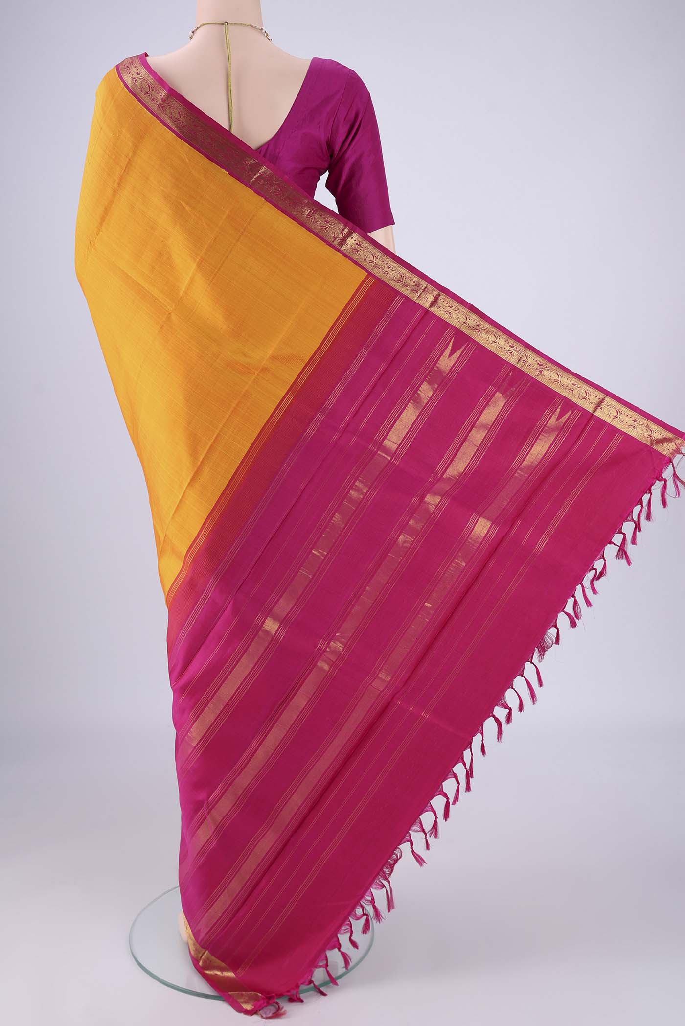Flat view of Pure Silk Pure Zari Yellow Kanjivaram Saree with Plain Body and Zari Border. 