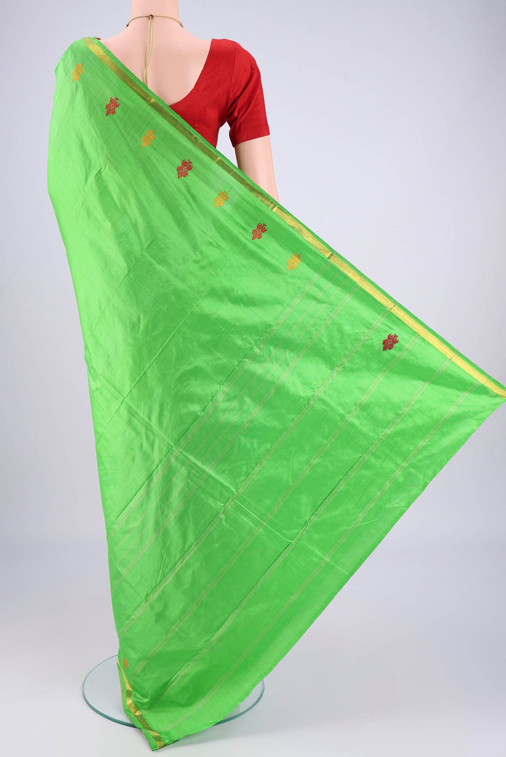 Flat view of Parrot Green Dual Tone Kanchipuram Saree with Plain Body and Zari And Thread Border. 