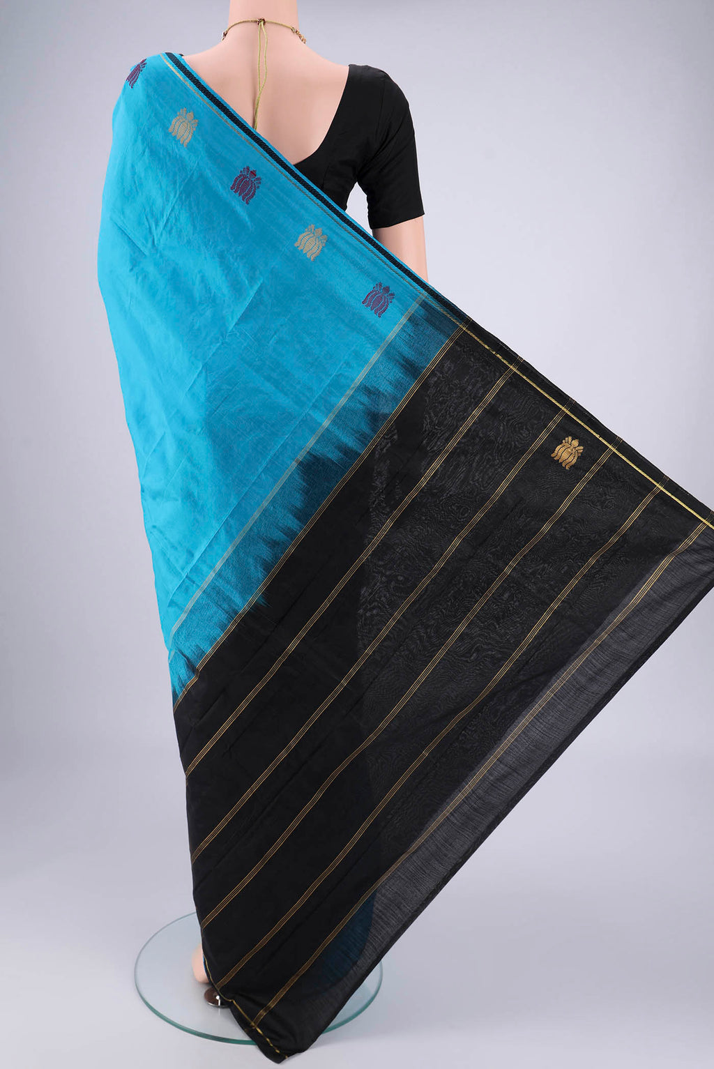 Flat view of Blue Dual Tone Kanchipuram Saree with Plain Body and Zari And Thread Border. 