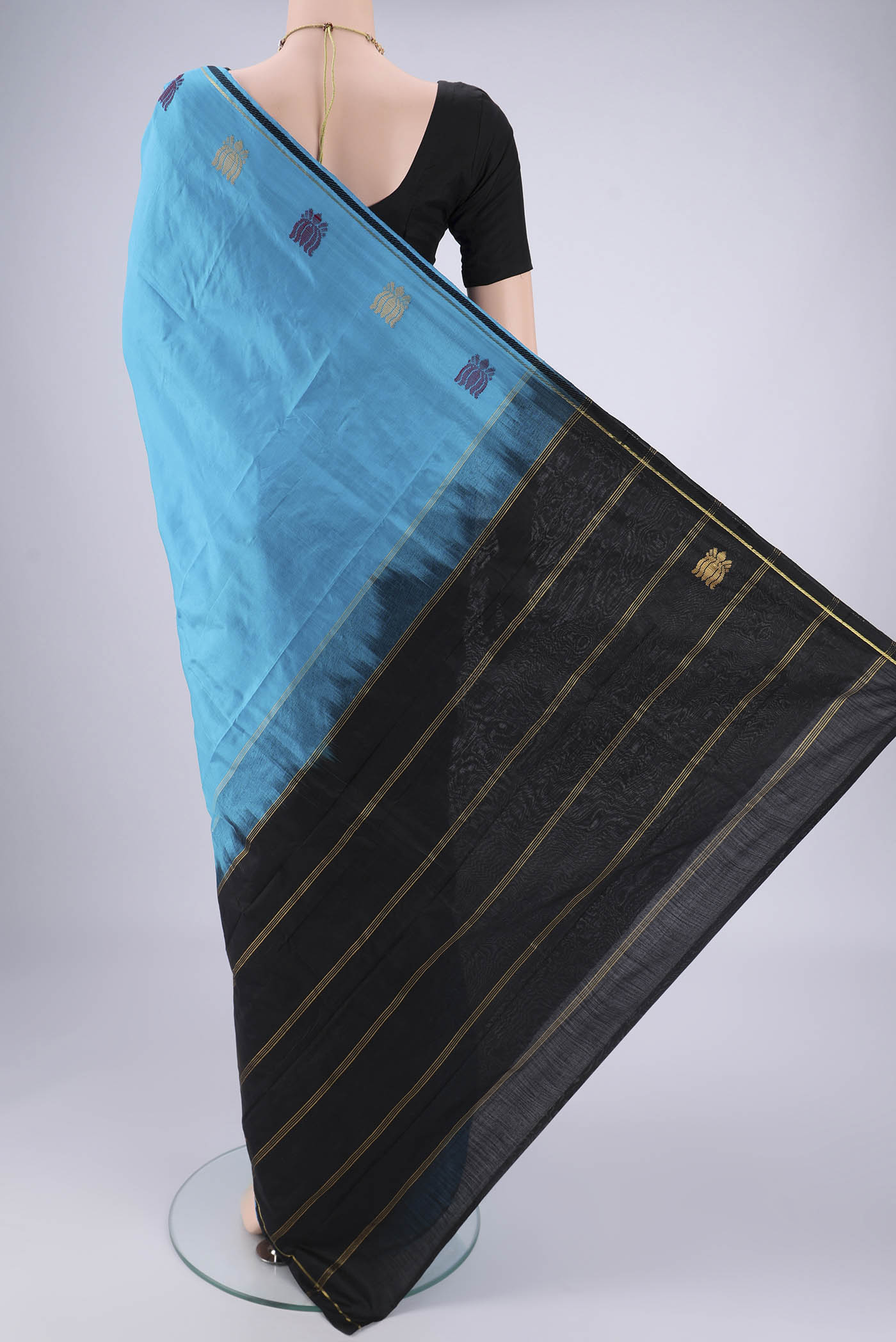 Flat view of Blue Dual Tone Kanchipuram Saree with Plain Body and Zari And Thread Border. 