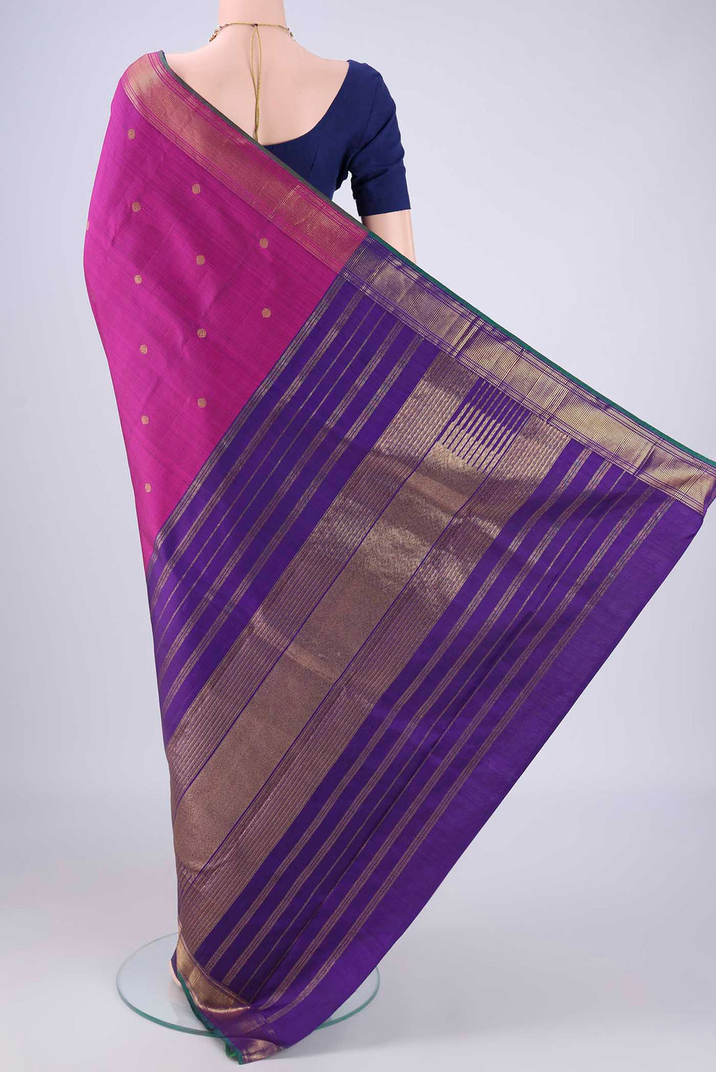 Flat view of Pure Silk Pure Zari Magenta Kanchipuram Saree with Partli on the body and Zari Border. 
