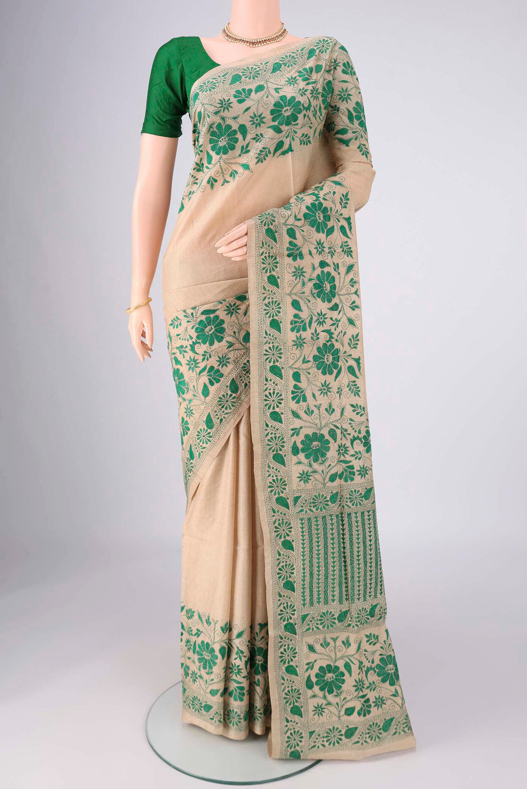Beige Tussar Silk Saree with Kantha Work on the body and Thread Border.  displayed on a mannequin