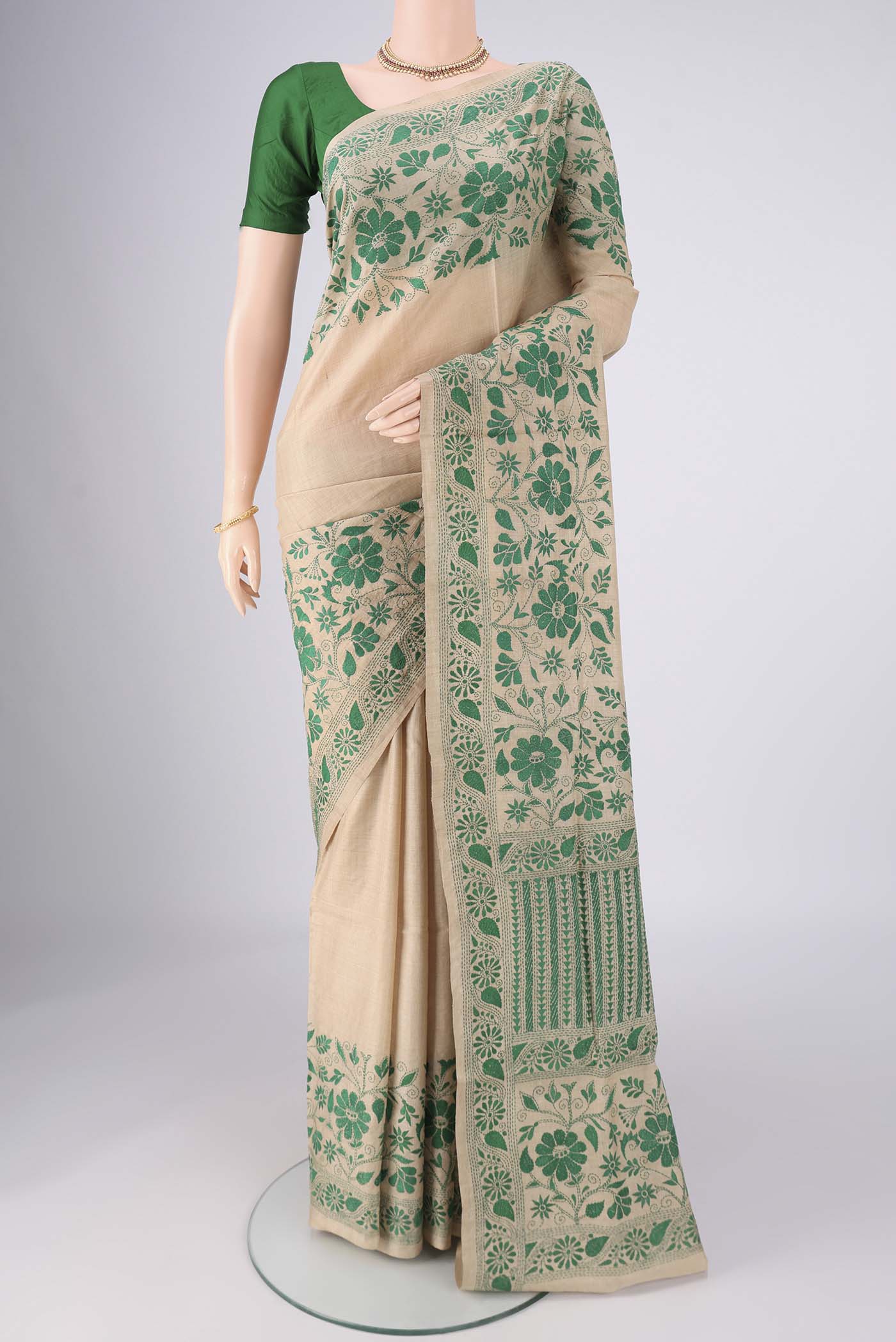Beige Tussar Silk Saree with Kantha Work on the body and Thread Border.  displayed on a mannequin