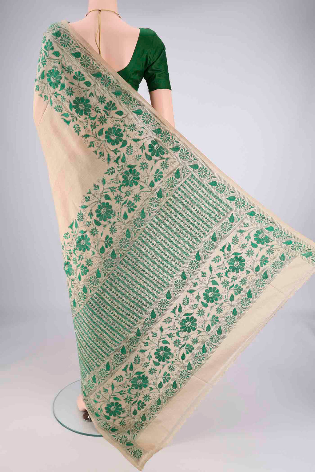 Flat view of Beige Tussar Silk Saree with Kantha Work on the body and Thread Border. 