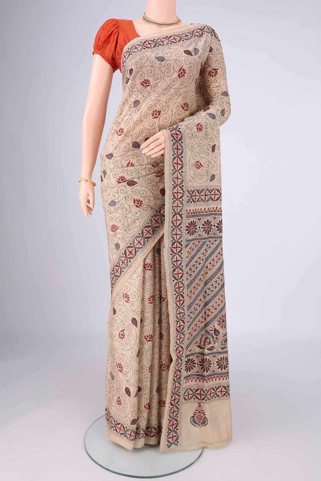 Beige Tussar Silk Saree with Kantha Work on the body and Thread Border.  displayed on a mannequin