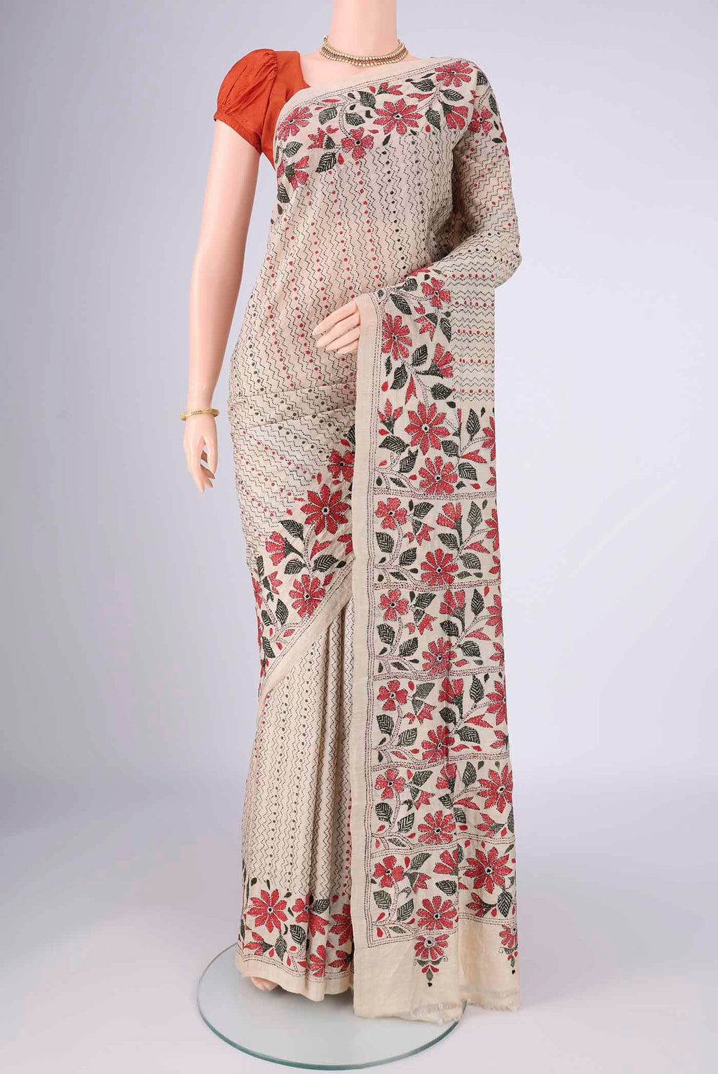 Beige Tussar Silk Saree with Kantha Work on the body and Thread Border.  displayed on a mannequin