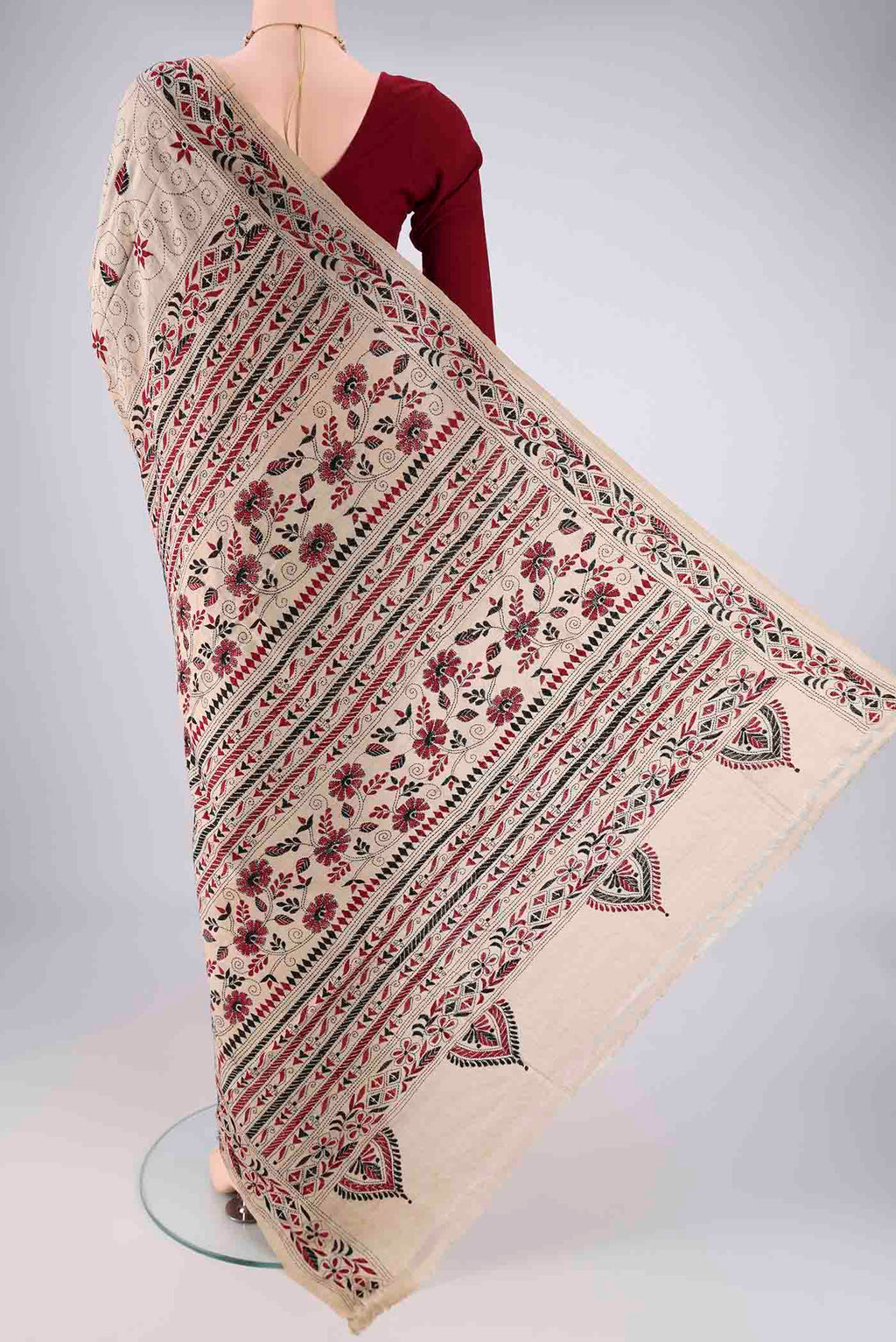 Flat view of Beige Tussar Silk Saree with Kantha Work on the body and Thread Border. 