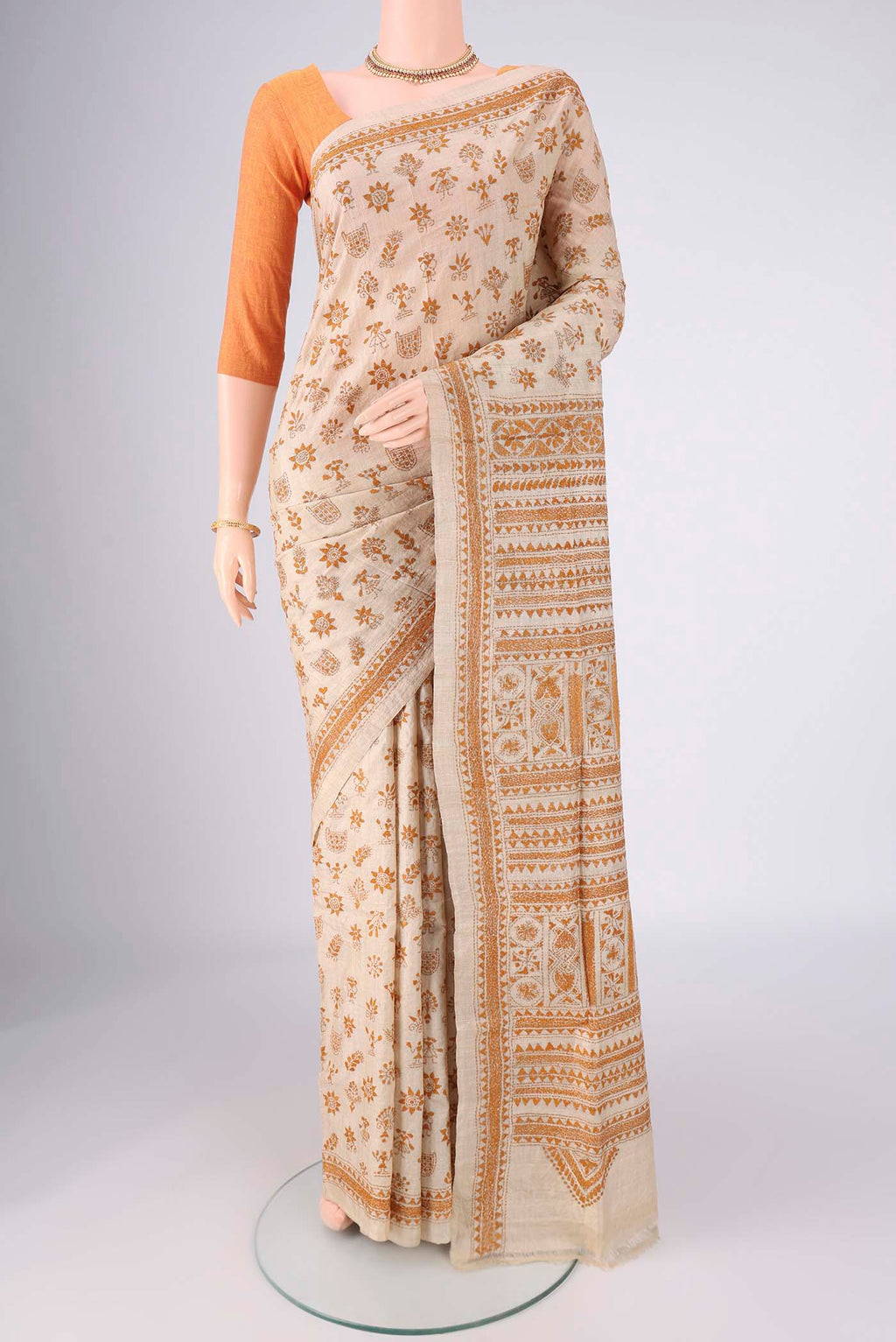 Beige Tussar Silk Saree with Kantha Work on the body and Thread Border.  displayed on a mannequin