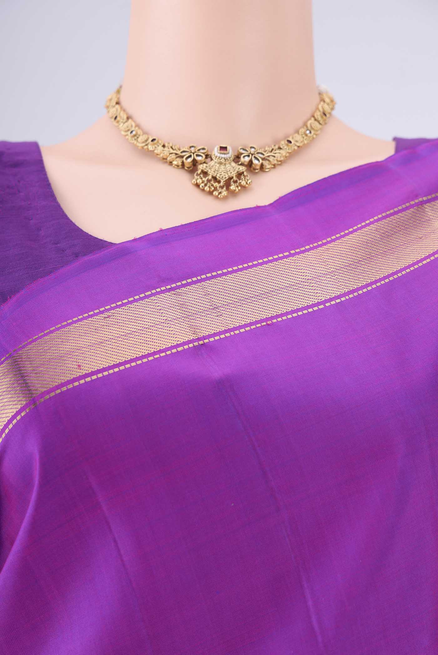 Border image of Purple Dual Tone Kanjivaram Saree with Plain Body and Zari Border. 