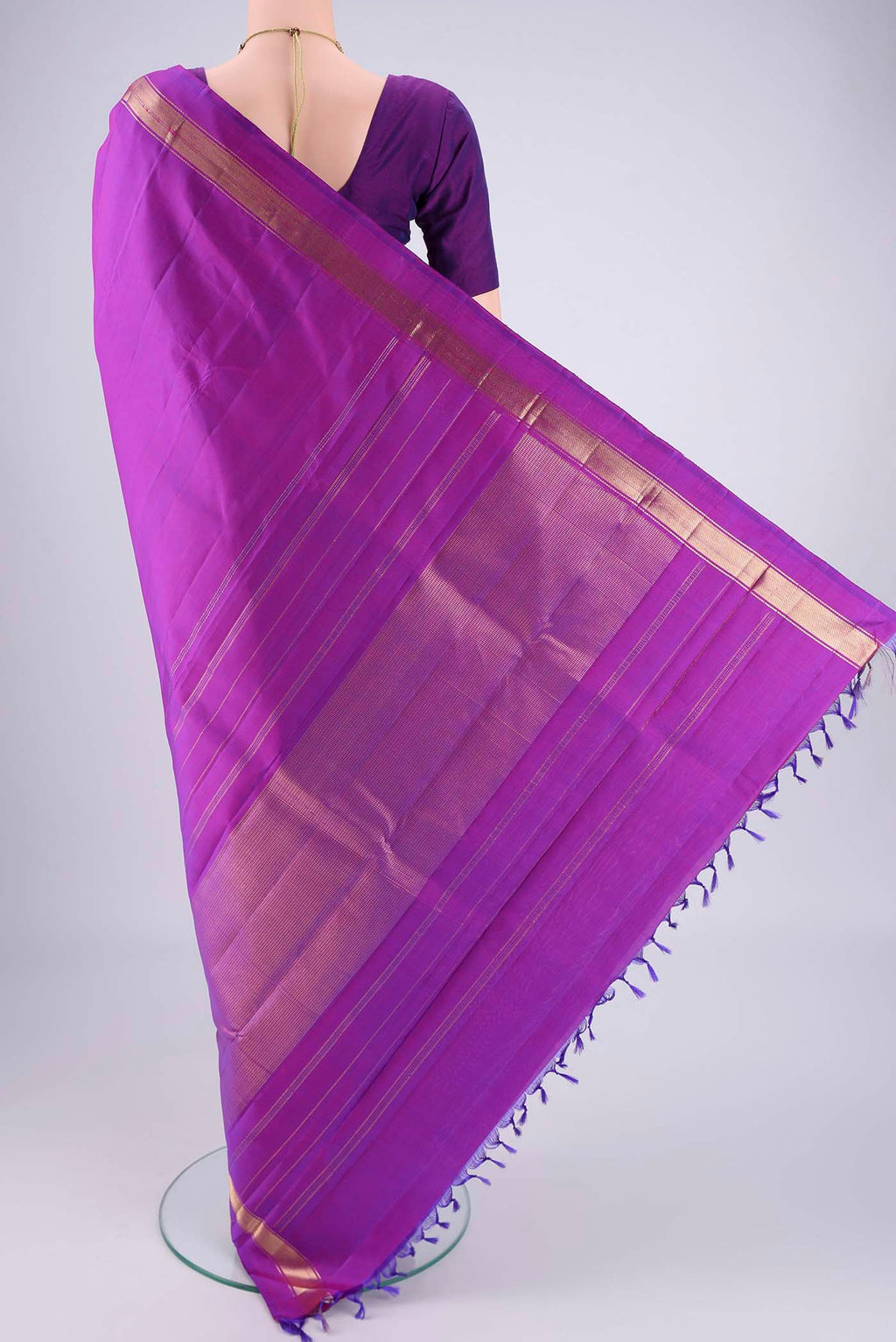 Flat view of Purple Dual Tone Kanjivaram Saree with Plain Body and Zari Border. 