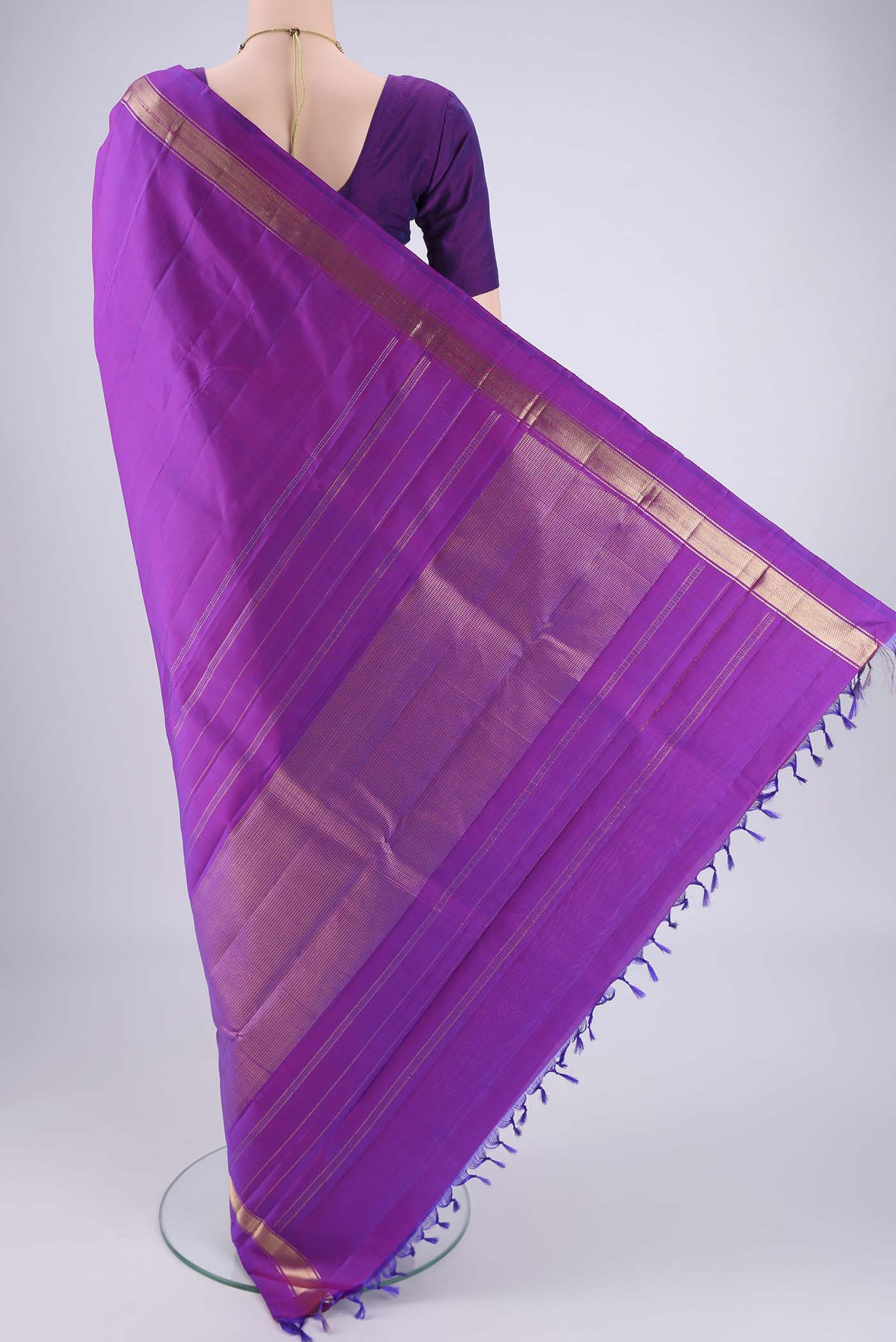 Flat view of Purple Dual Tone Kanjivaram Saree with Plain Body and Zari Border. 