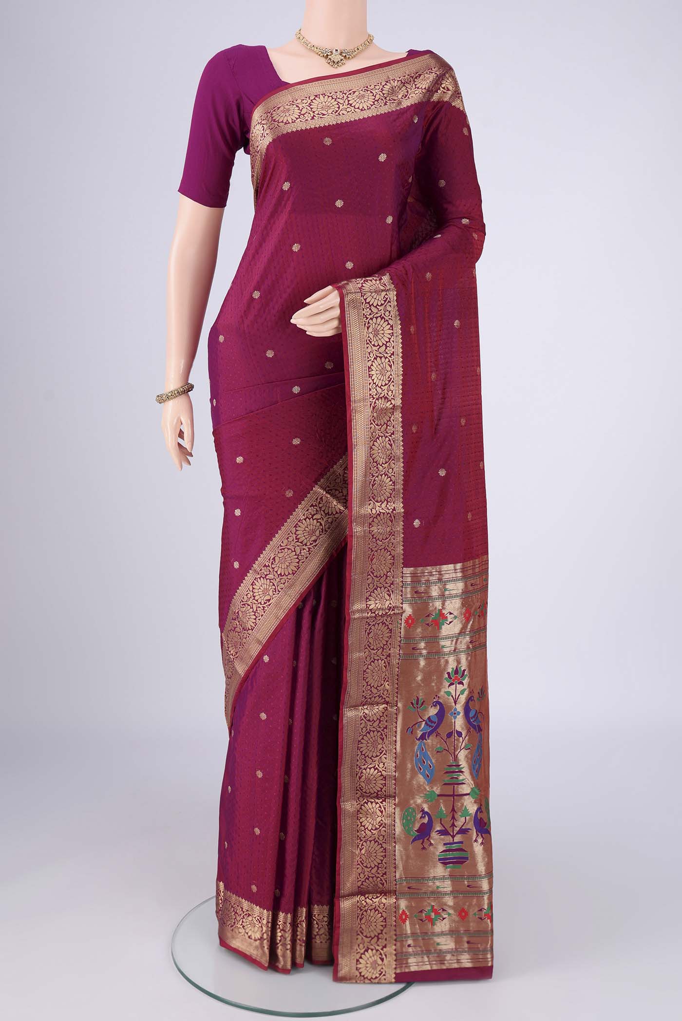 Magenta Dual Tone Blended Bangalore Silk Saree with Jacquard With Zari Butta on the body and Zari Border.  displayed on a mannequin