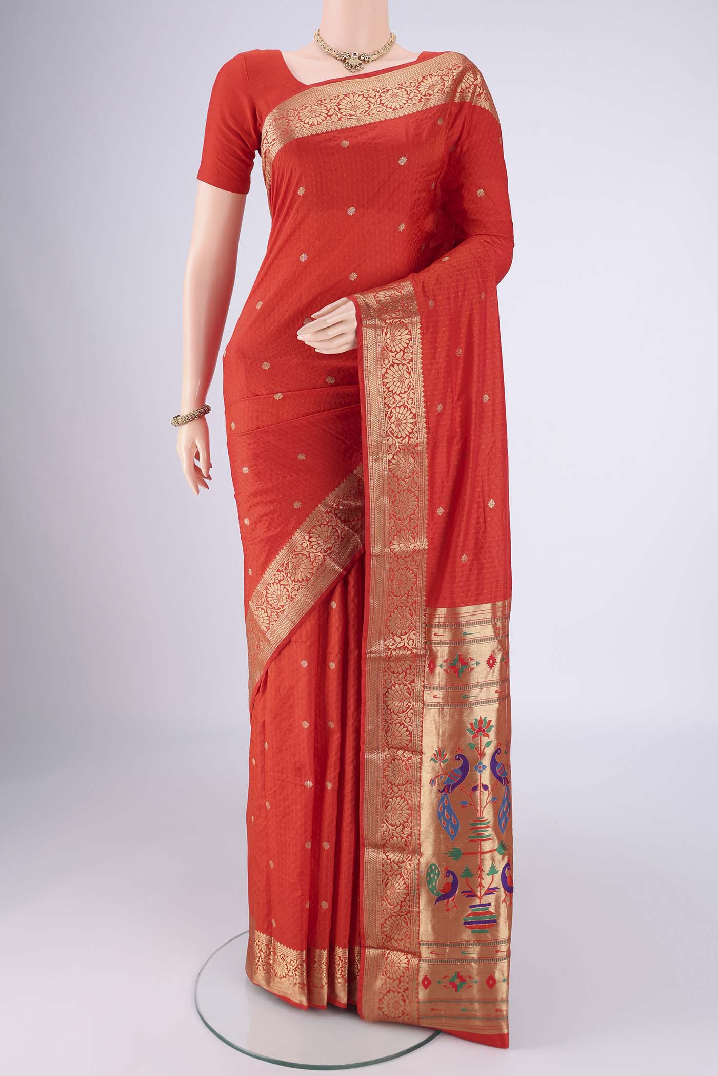 Imperial Red Dual Tone Blended Bangalore Silk Saree with Jacquard With Zari Butta on the body and Zari Border.  displayed on a mannequin
