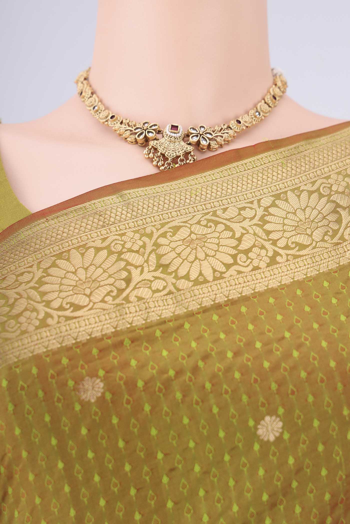 Border image of Light Green Dual Tone Blended Bangalore Silk Saree with Jacquard With Zari Butta on the body and Zari Border. 