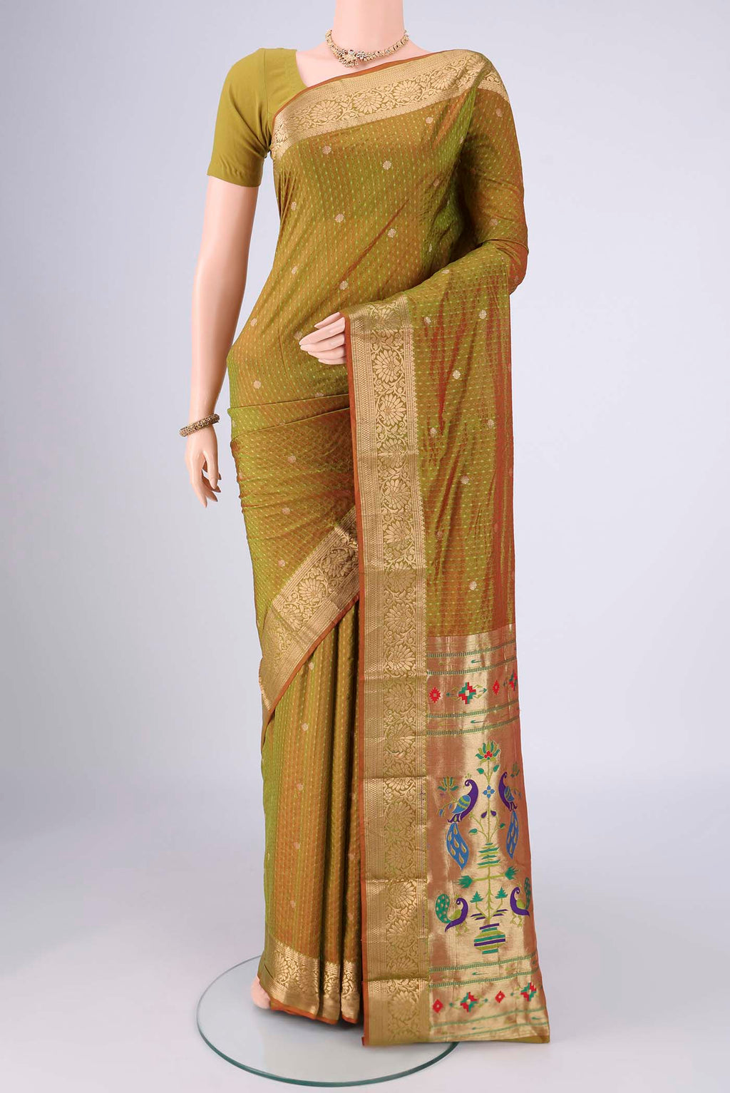 Light Green Dual Tone Blended Bangalore Silk Saree with Jacquard With Zari Butta on the body and Zari Border.  displayed on a mannequin