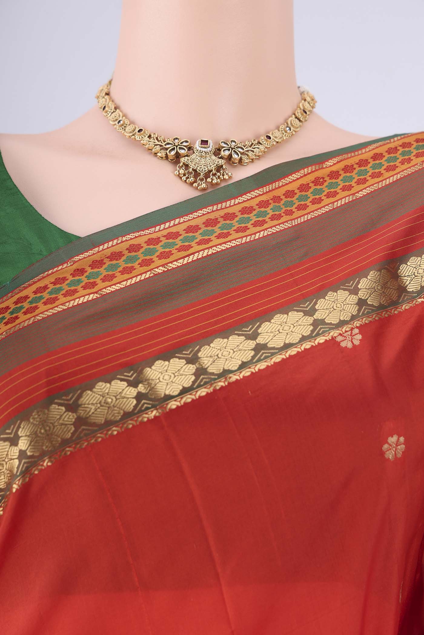 Border image of Orange Dual Tone Blended Bangalore Silk Saree with Zari Butta on the body and Zari Border. 