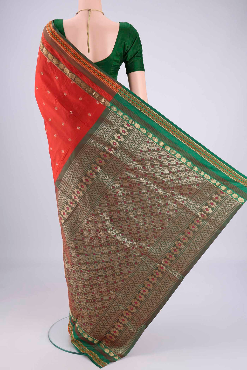 Flat view of Orange Dual Tone Blended Bangalore Silk Saree with Zari Butta on the body and Zari Border. 