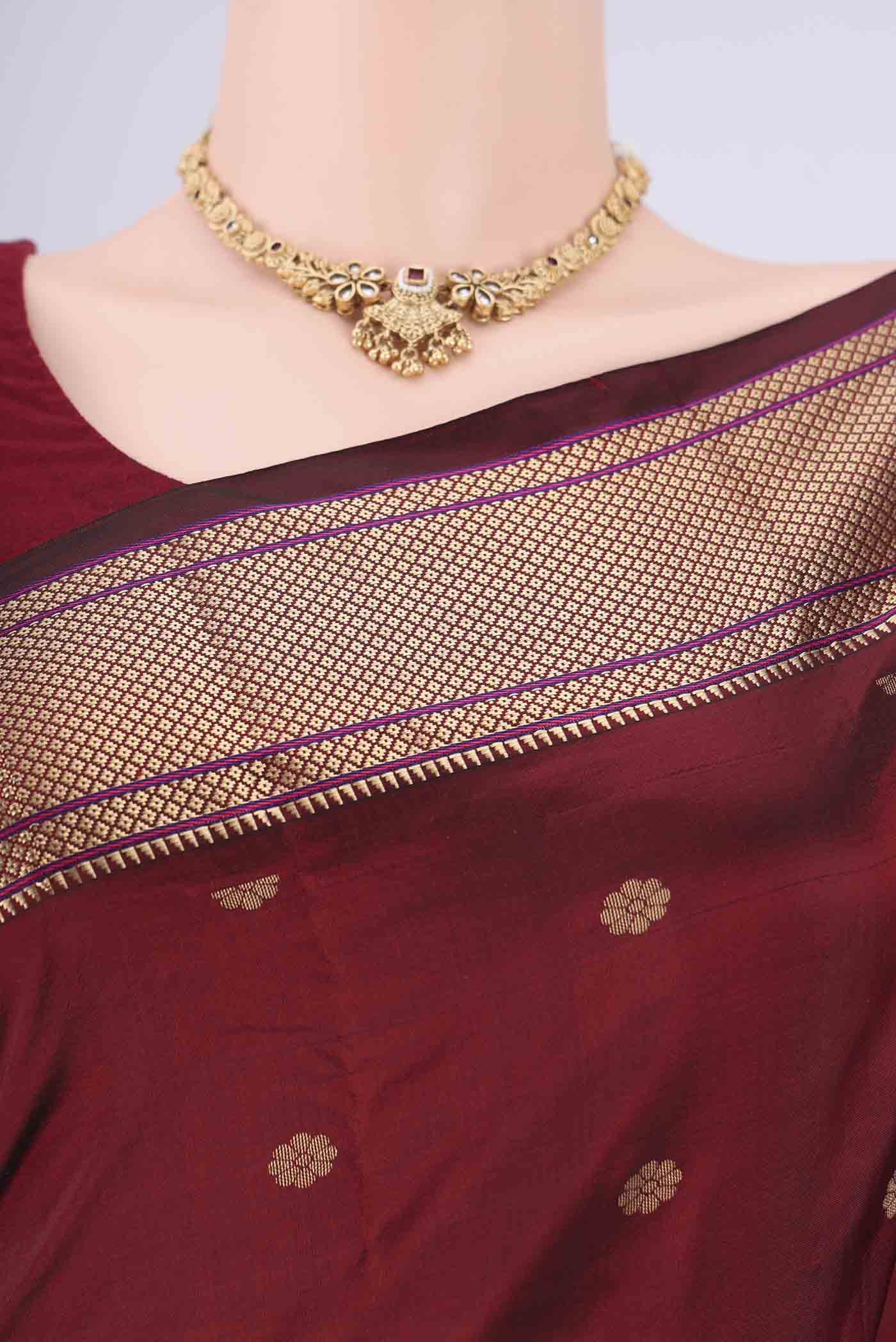 Border image of Maroon Dual Tone Blended Bangalore Silk Saree with Zari Butta on the body and Zari Border. 