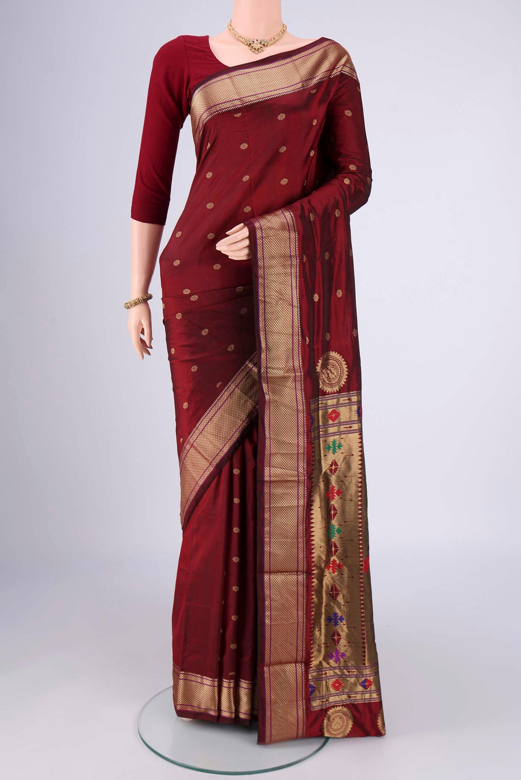 Maroon Dual Tone Blended Bangalore Silk Saree with Zari Butta on the body and Zari Border.  displayed on a mannequin