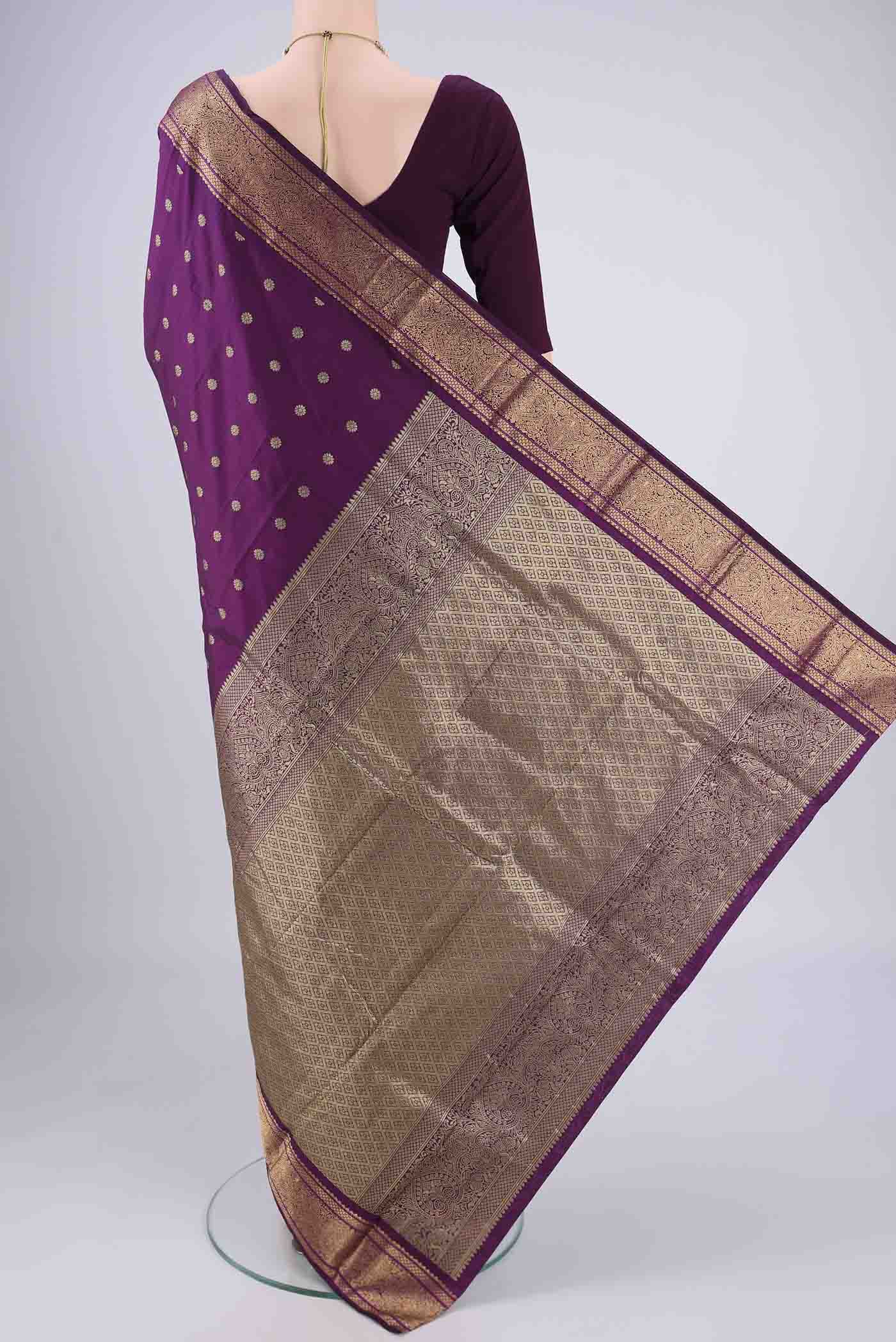 Flat view of Purple Dual Tone Blended Bangalore Silk Saree with Zari Butta on the body and Zari Border. 
