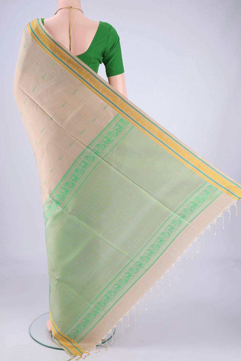 Flat view of Beige Soft Silk Saree with Thread Butta on the body and Thread Border. 
